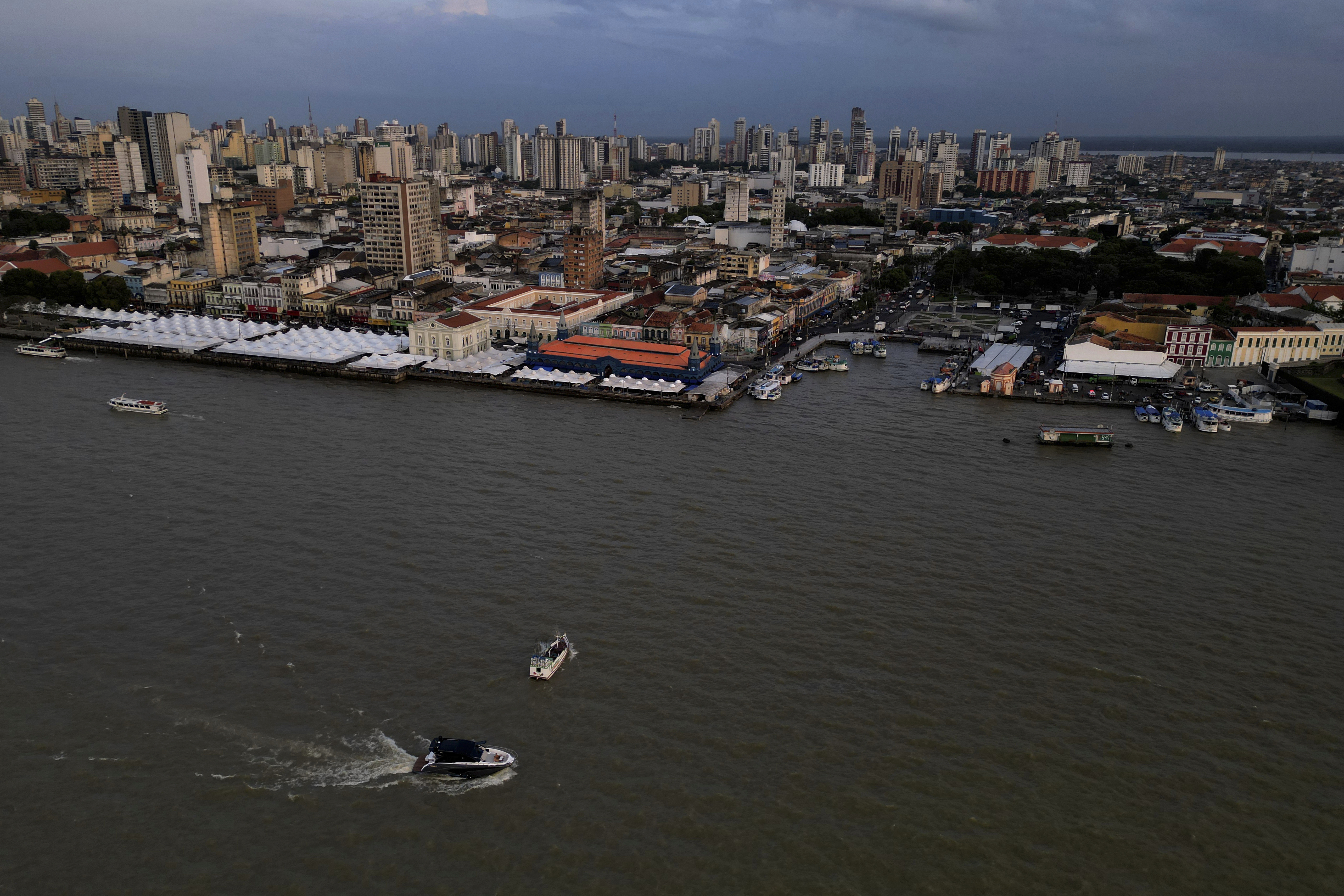 A boat moves through Guajara Bay ahead of the Cop30 UN climate summit, in Belem, Brazil