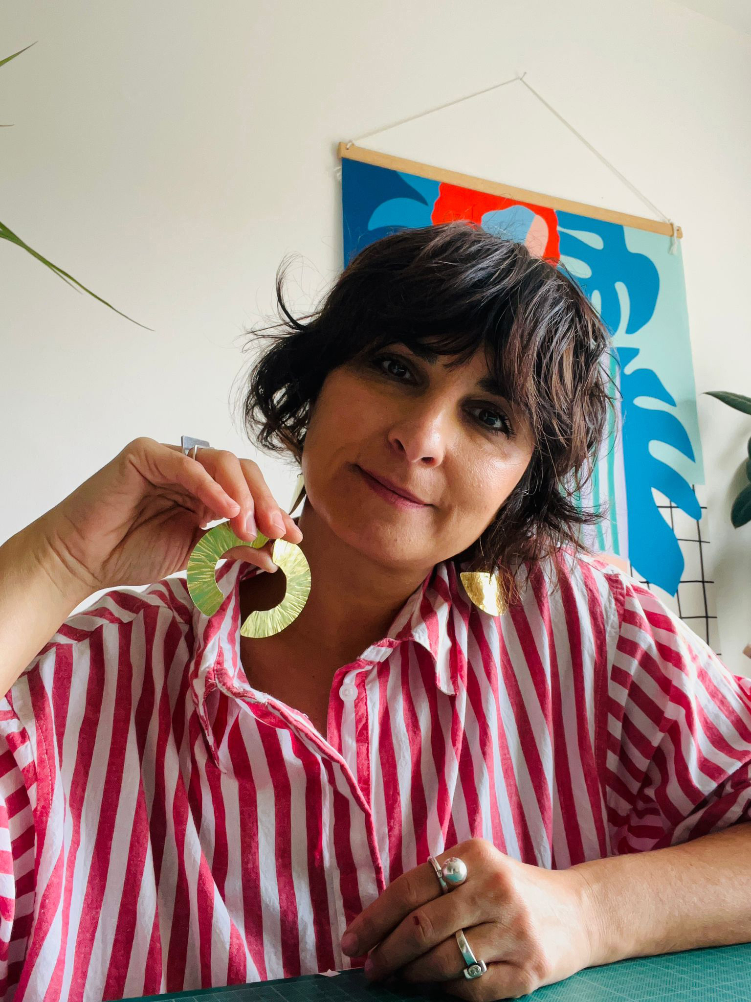 Daki with the same design of earrings worn by actor and TV host Siobhan McSweeney and singer CMAT