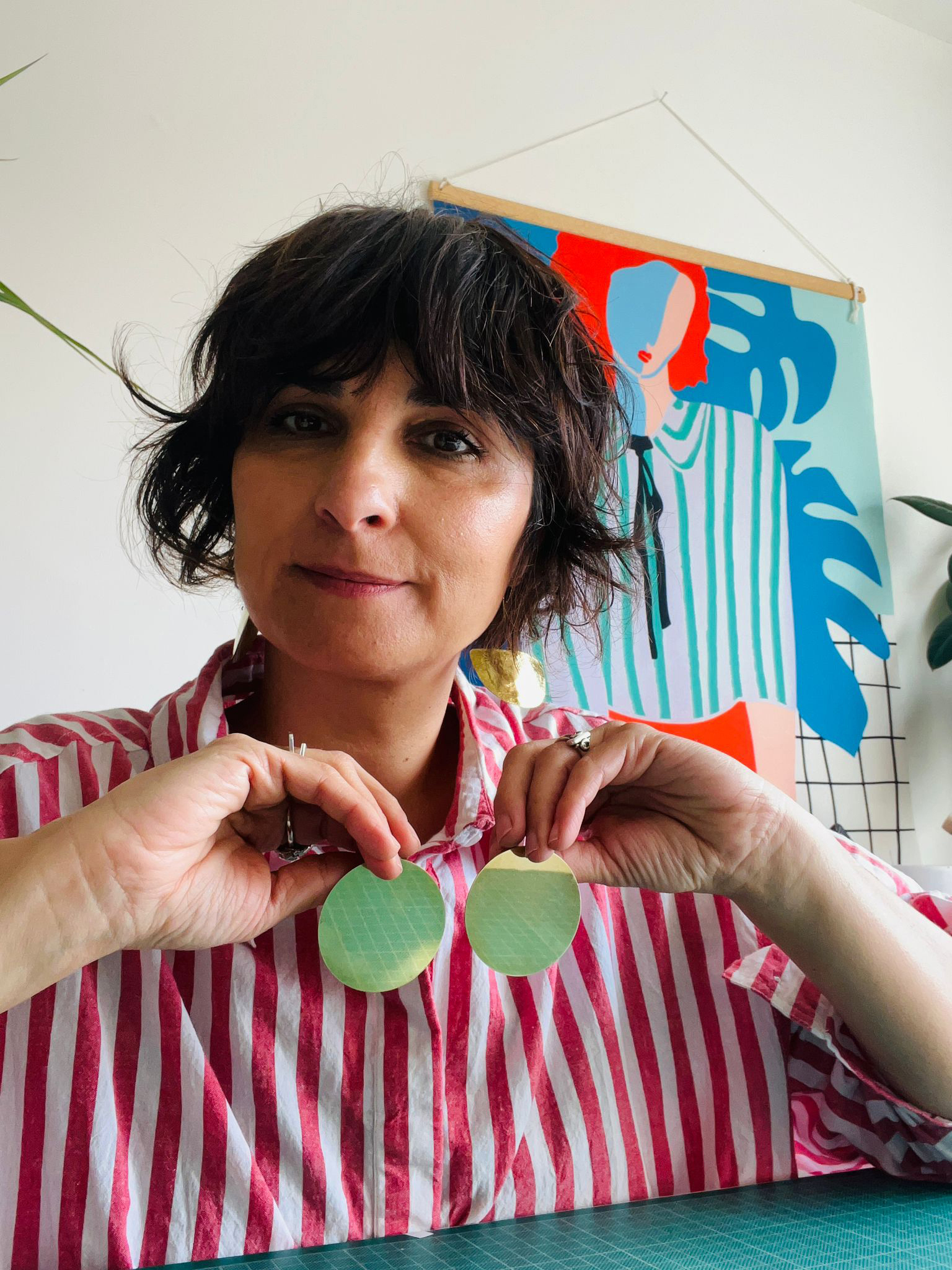 Daki with the same design of earrings worn by actor and TV host Siobhan McSweeney and singer CMAT