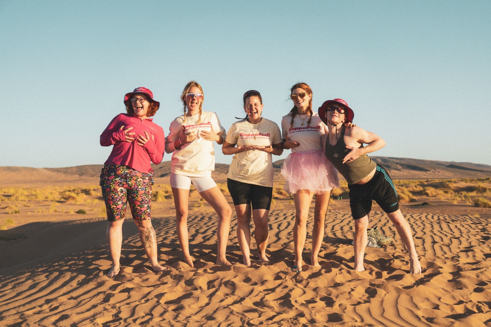 Carrie Hope Fletcher, Millie Mackintosh, Giovanna Fletcher, Ashley James and Bimini. in the Saharan desert (Marco Barcella/PA)