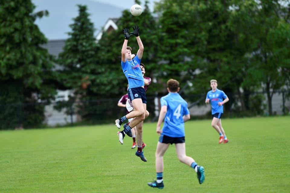 Charlie Smyth, leaps for the ball while in action for GAA club Mayobridge, aged 18 