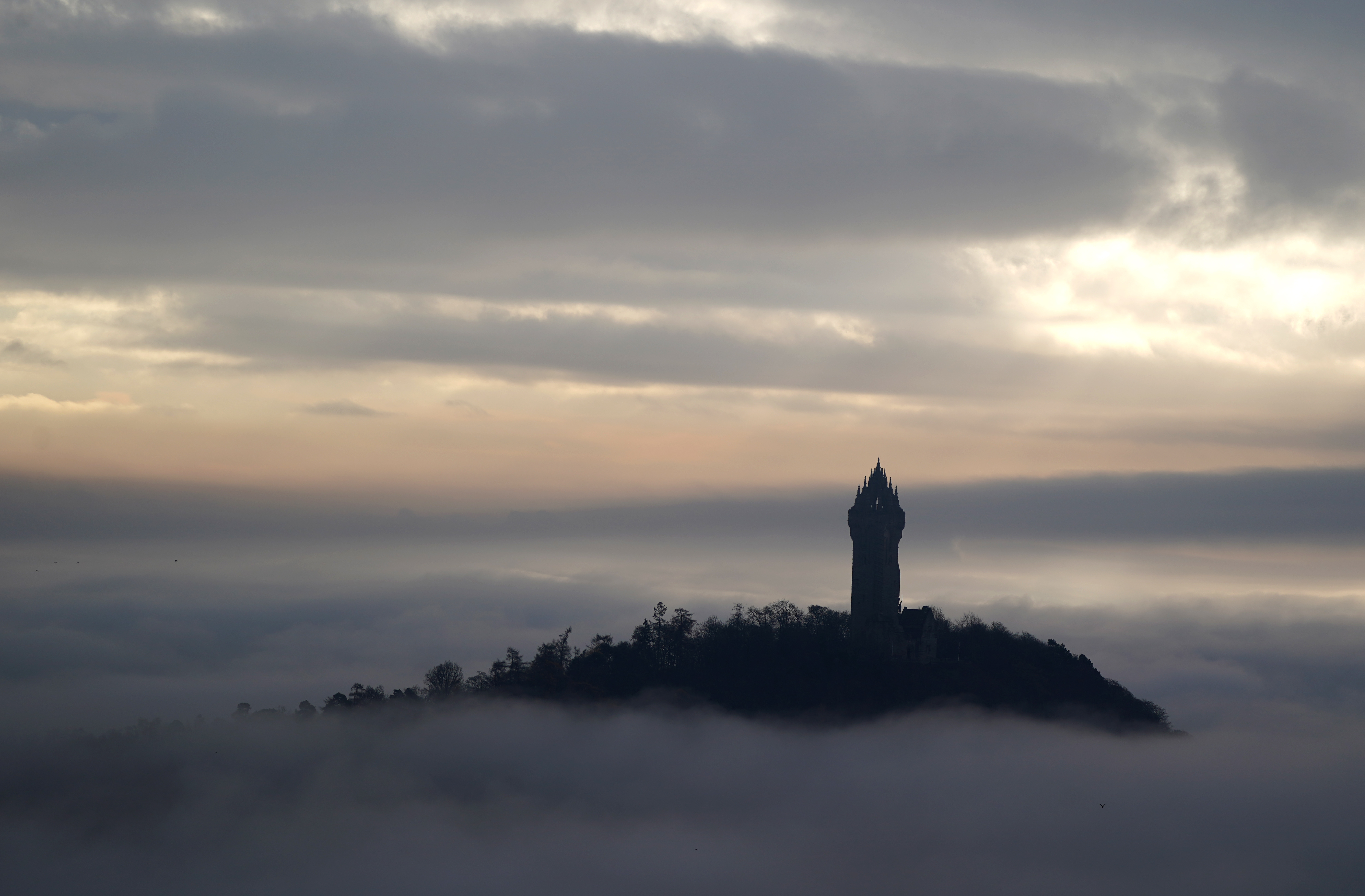 View of the Wallace Monument surrounded by mist