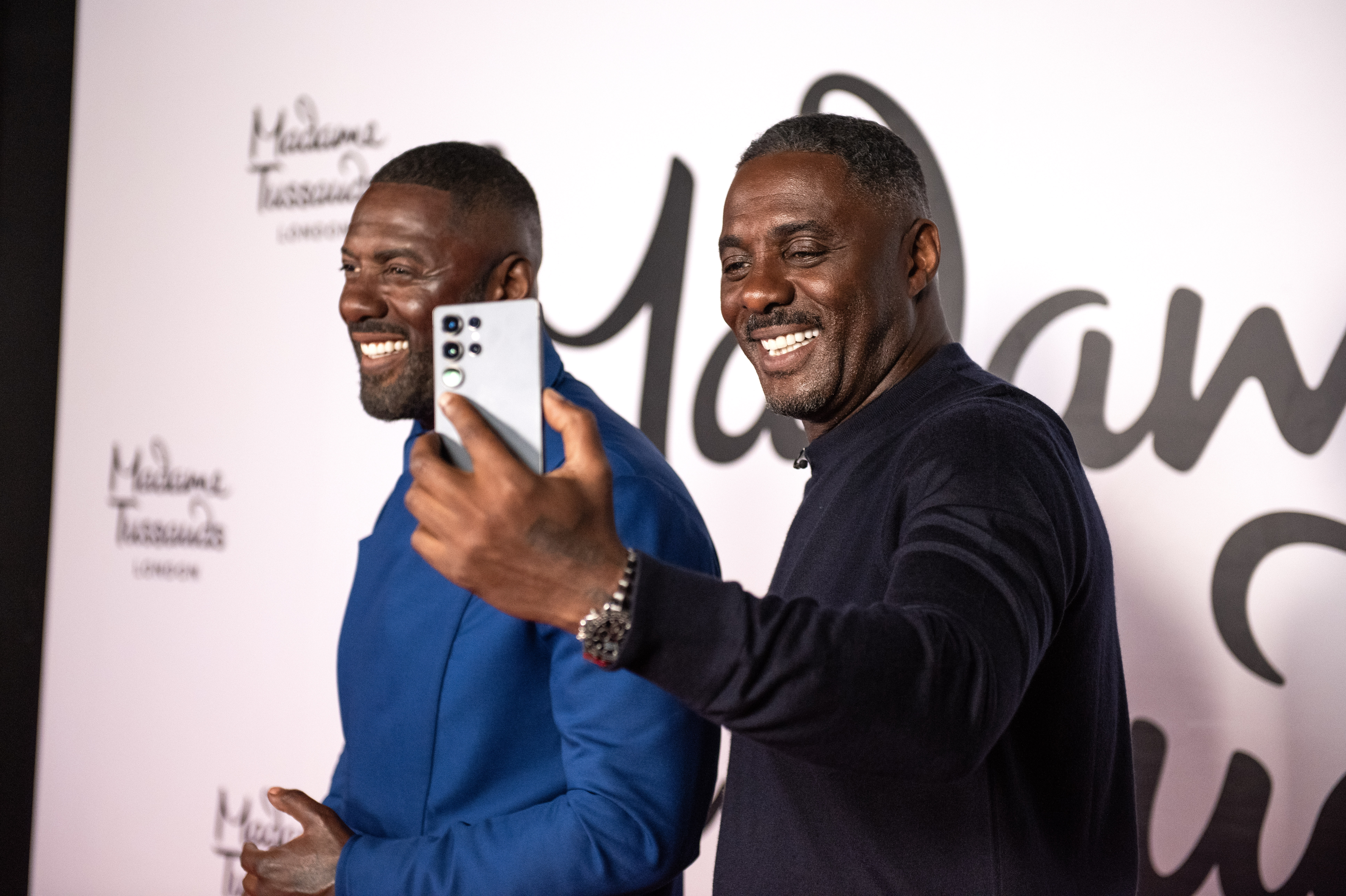 Idris Elba taking a selfie with his waxwork at Madame Tussauds London