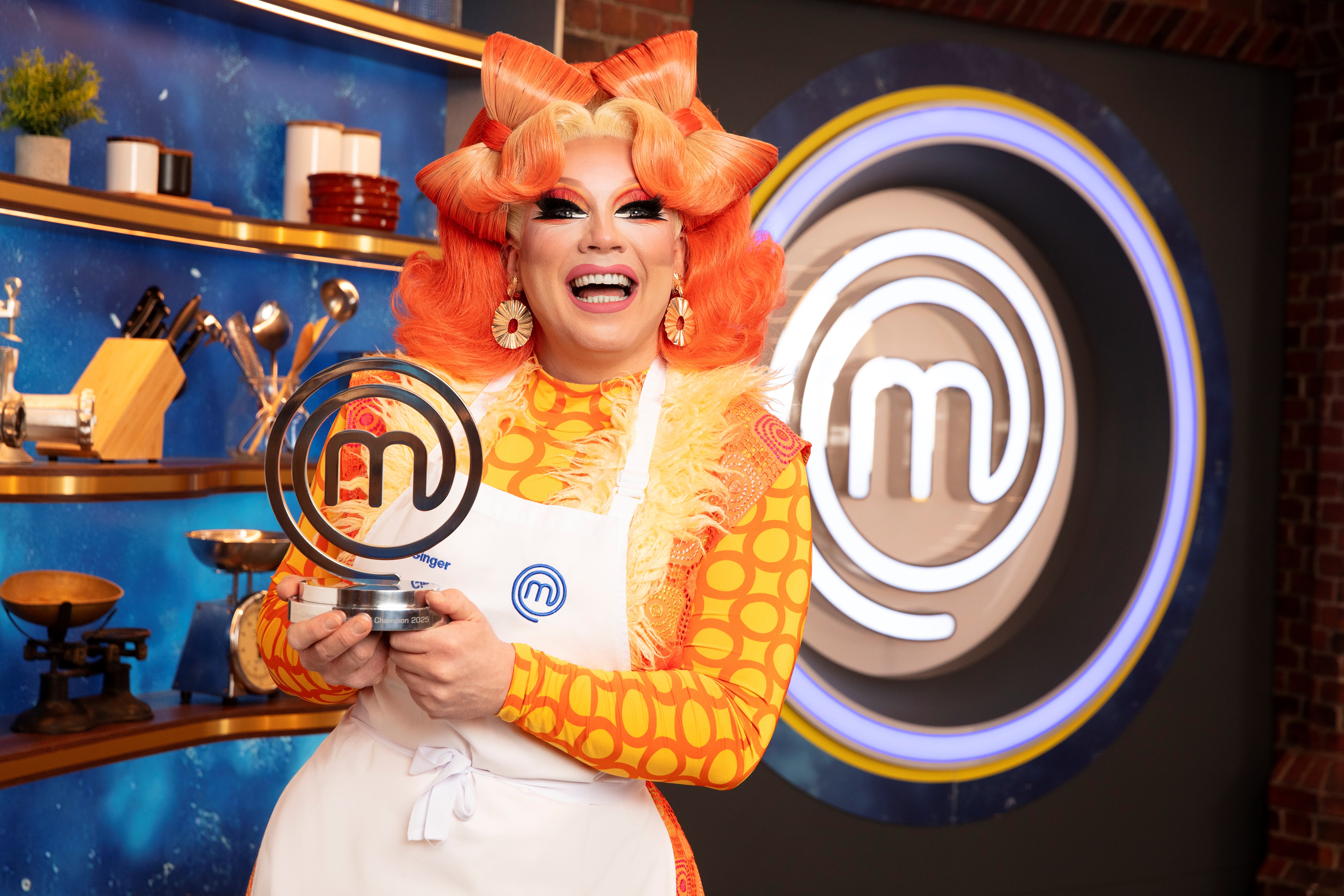 Ginger Johnson holding the Celebrity MasterChef trophy
