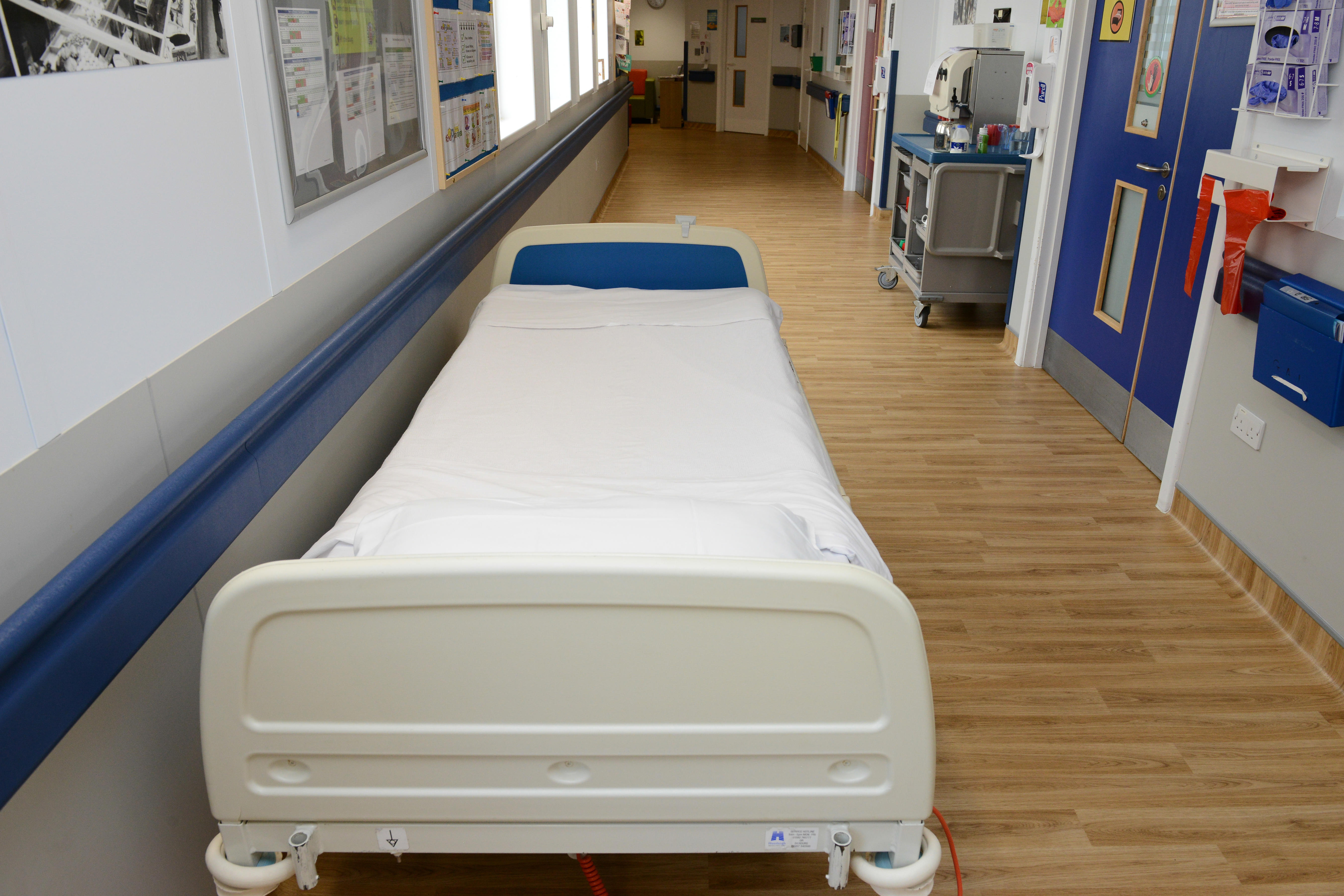 A bed in an NHS hospital corridor