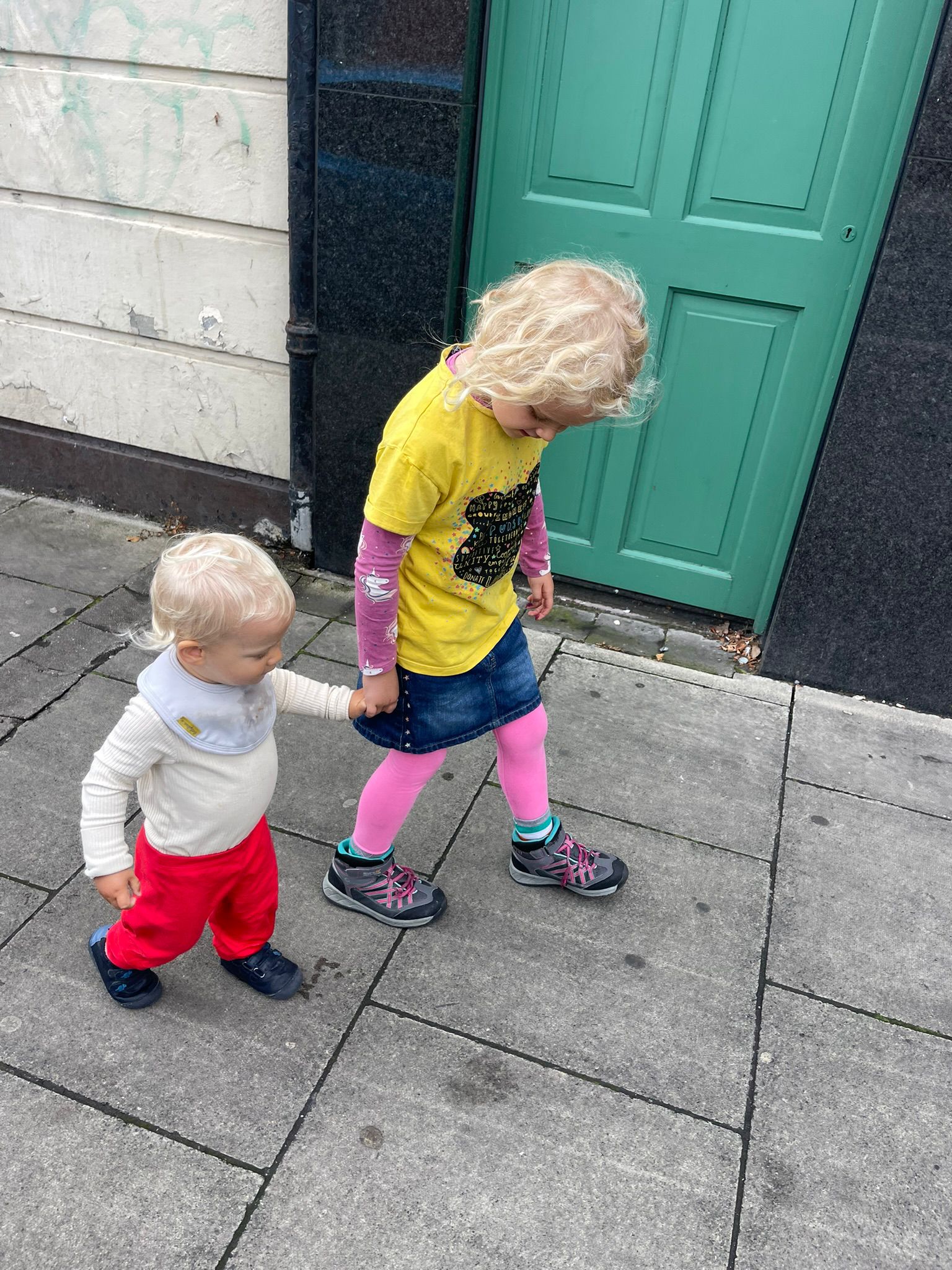 Ali, one, holding hands with Arya, seven