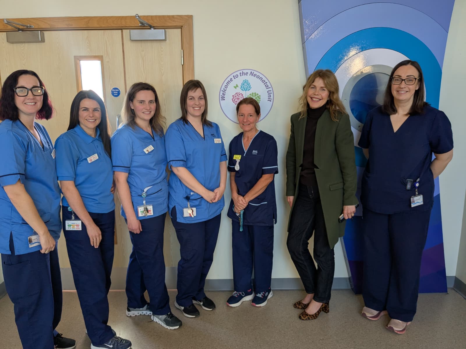 A group of nurses and other NHS staff