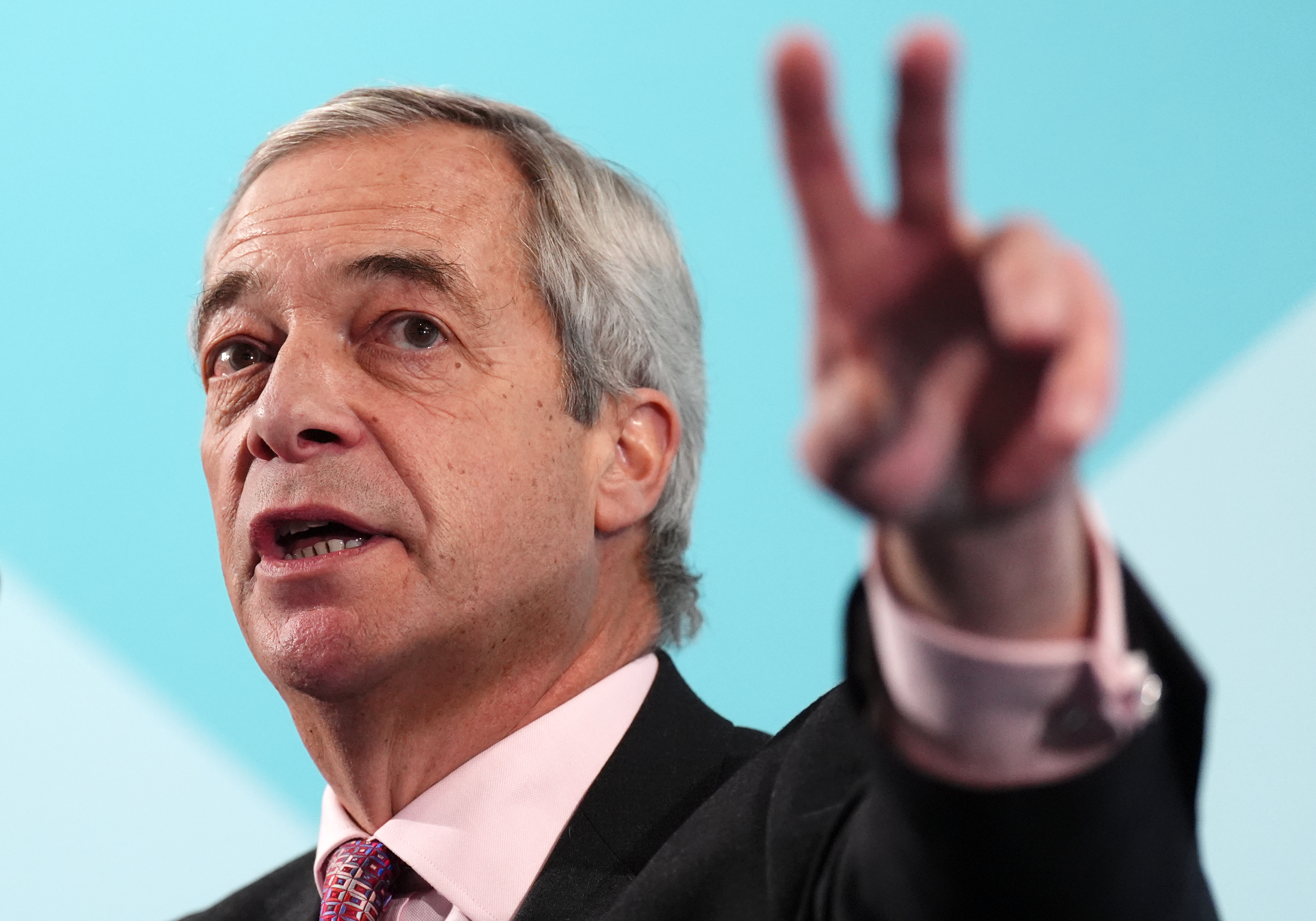 Nigel Farage gesturing with one hand