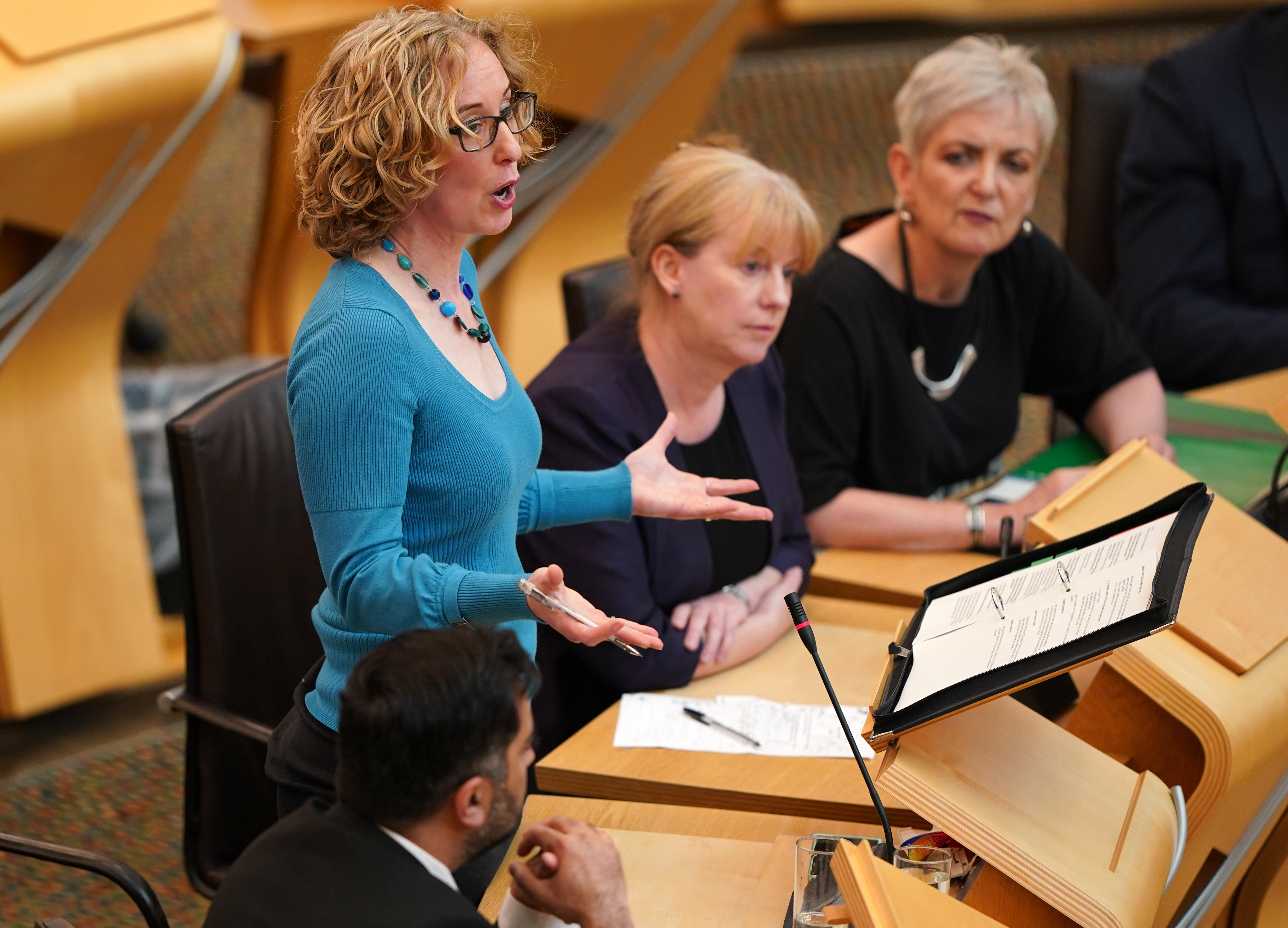 Lorna Slater standing while speaking