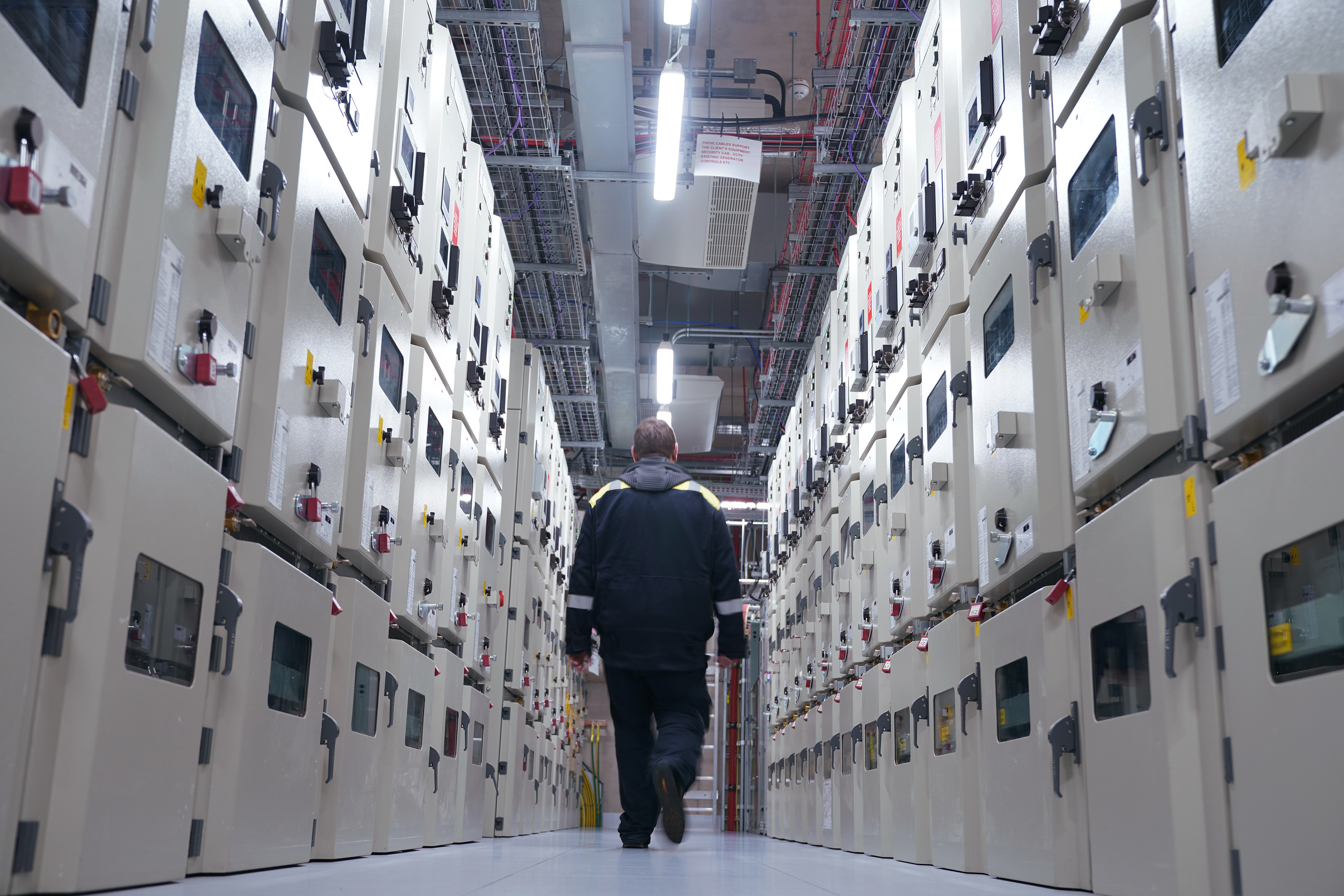 A man walks through a data centre