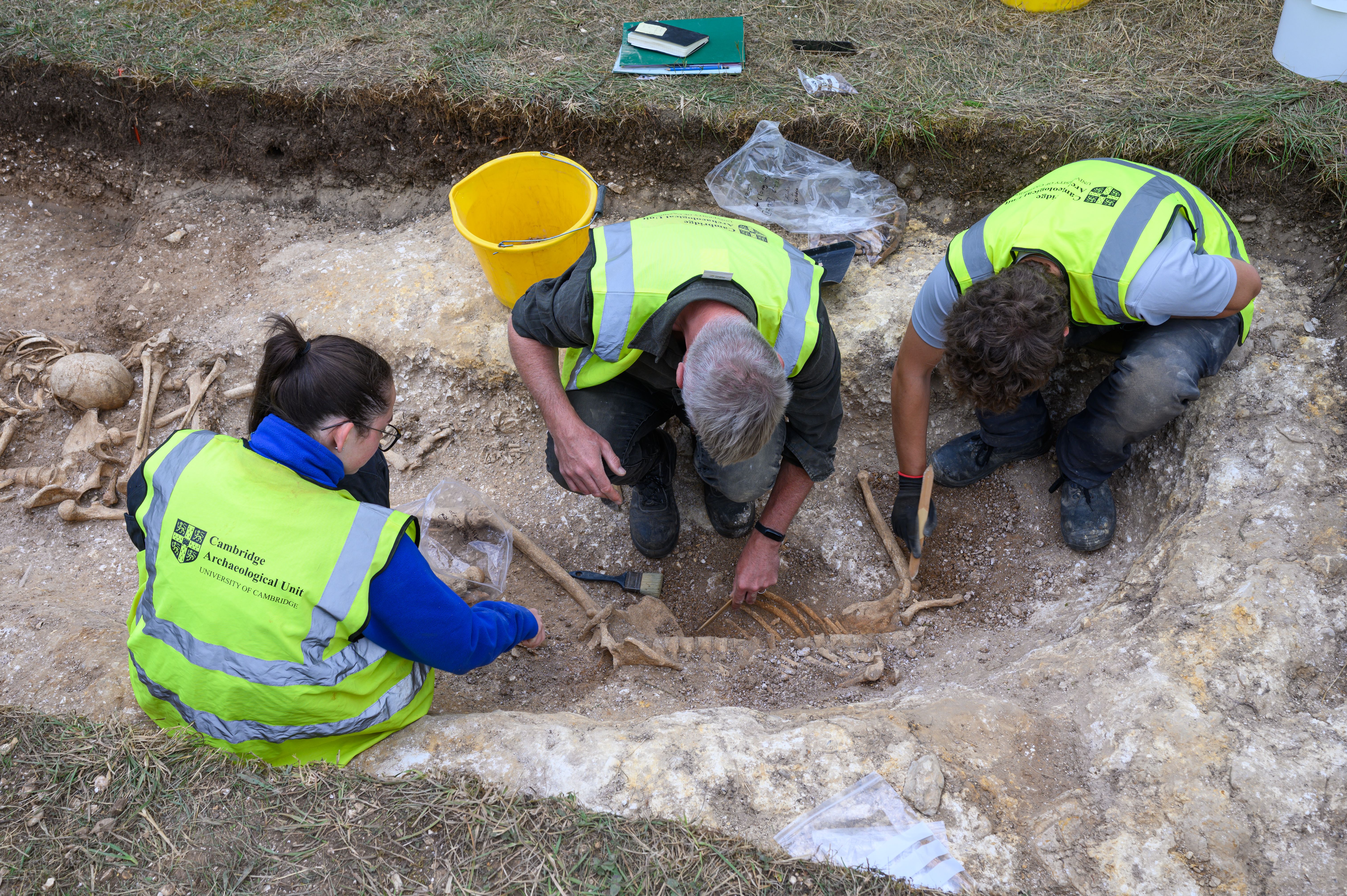 Students and staff excavating the possible execution pit discovered at Wandlebury Country Park near Cambridge. (Cambridge Archaeological Unit/David Matzliach/ PA)