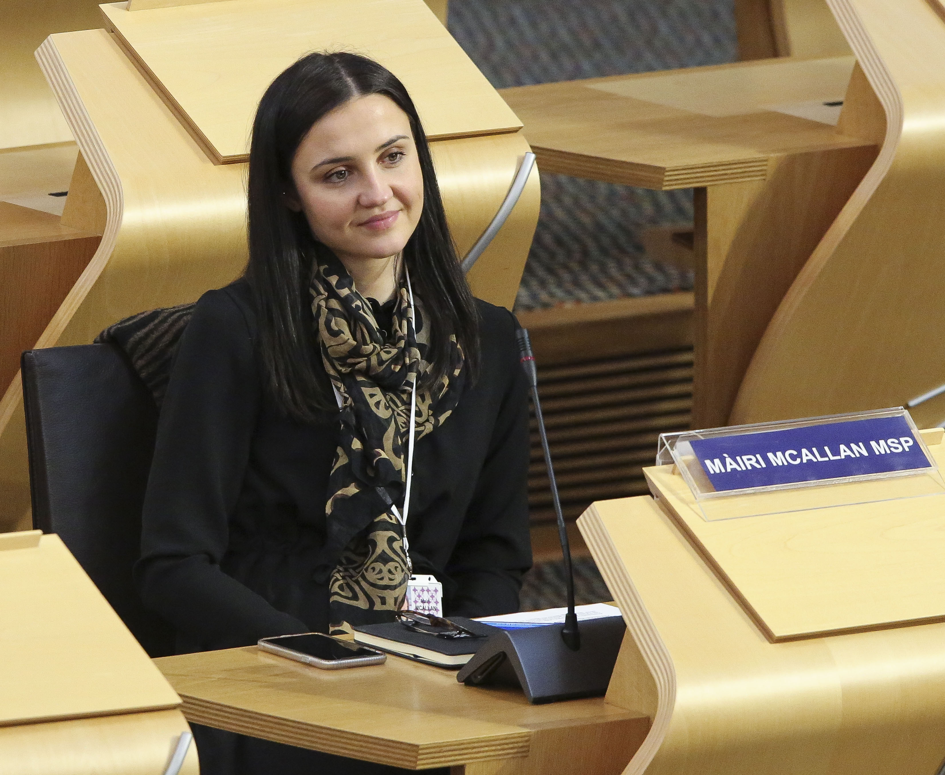 Mairi McAllan seated in Holyrood