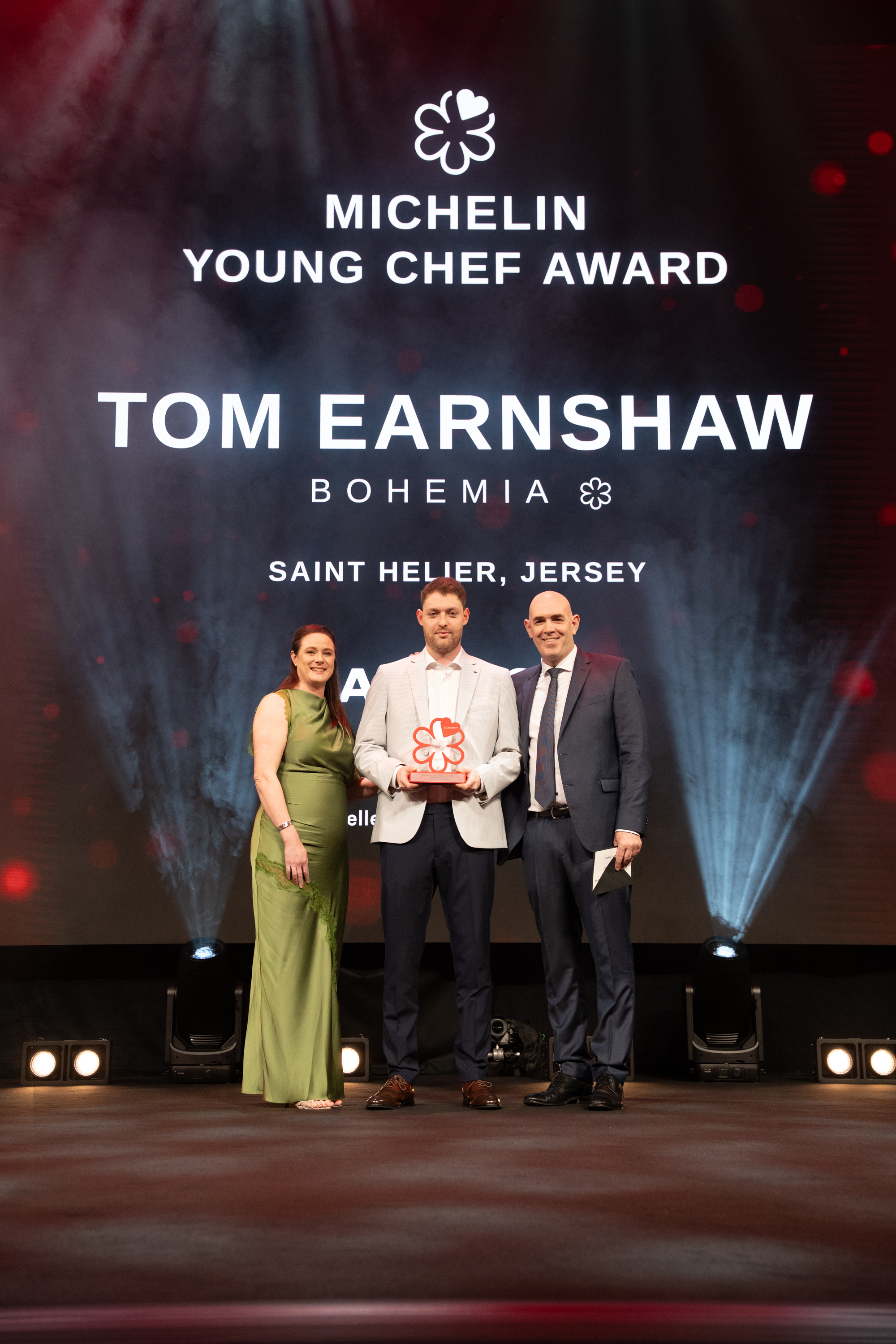Tom Earnshaw (centre) with Mary Jewell and Stuart Campbell of sponsors La Rousse Foods