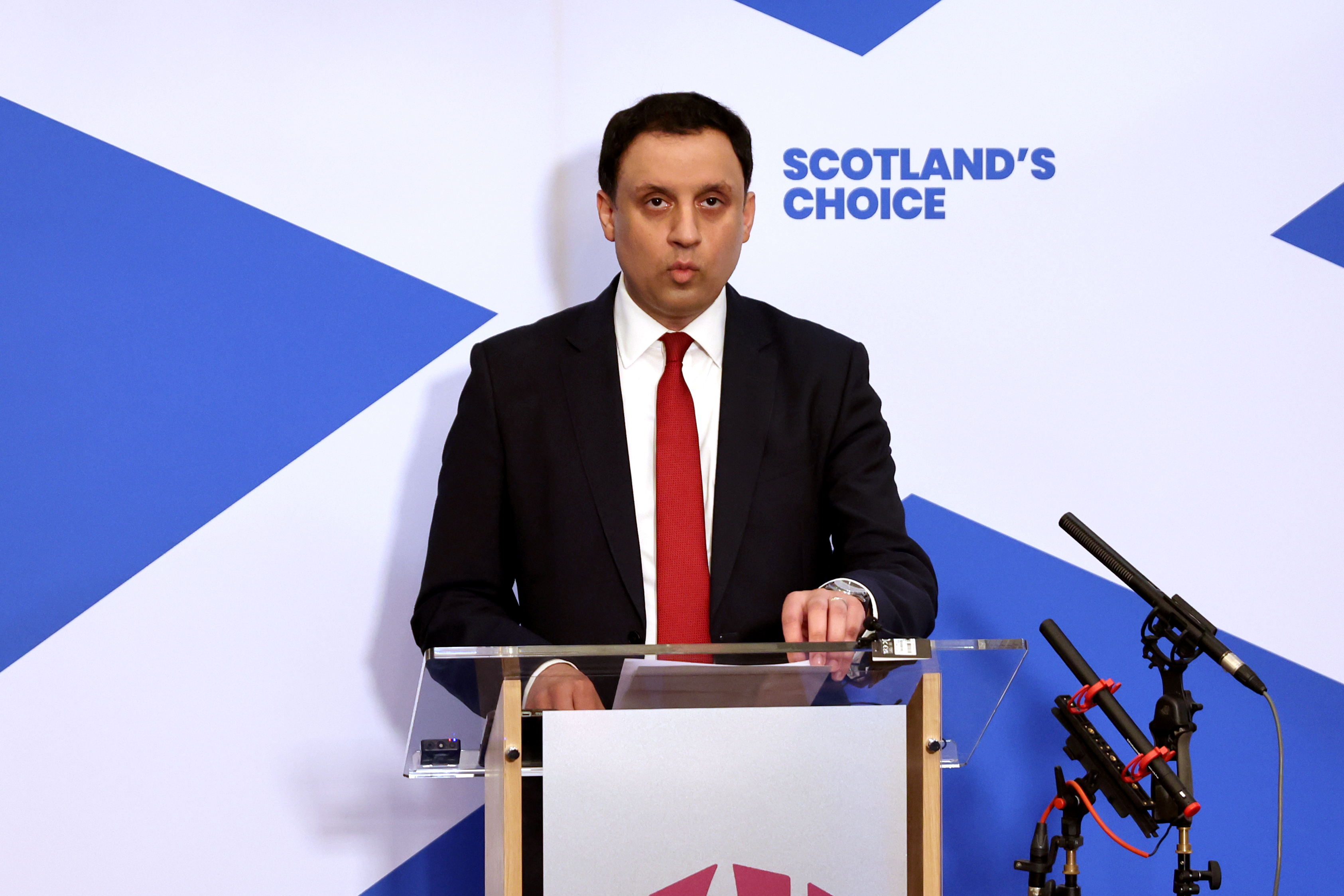 Anas Sarwar speaking from a lectern