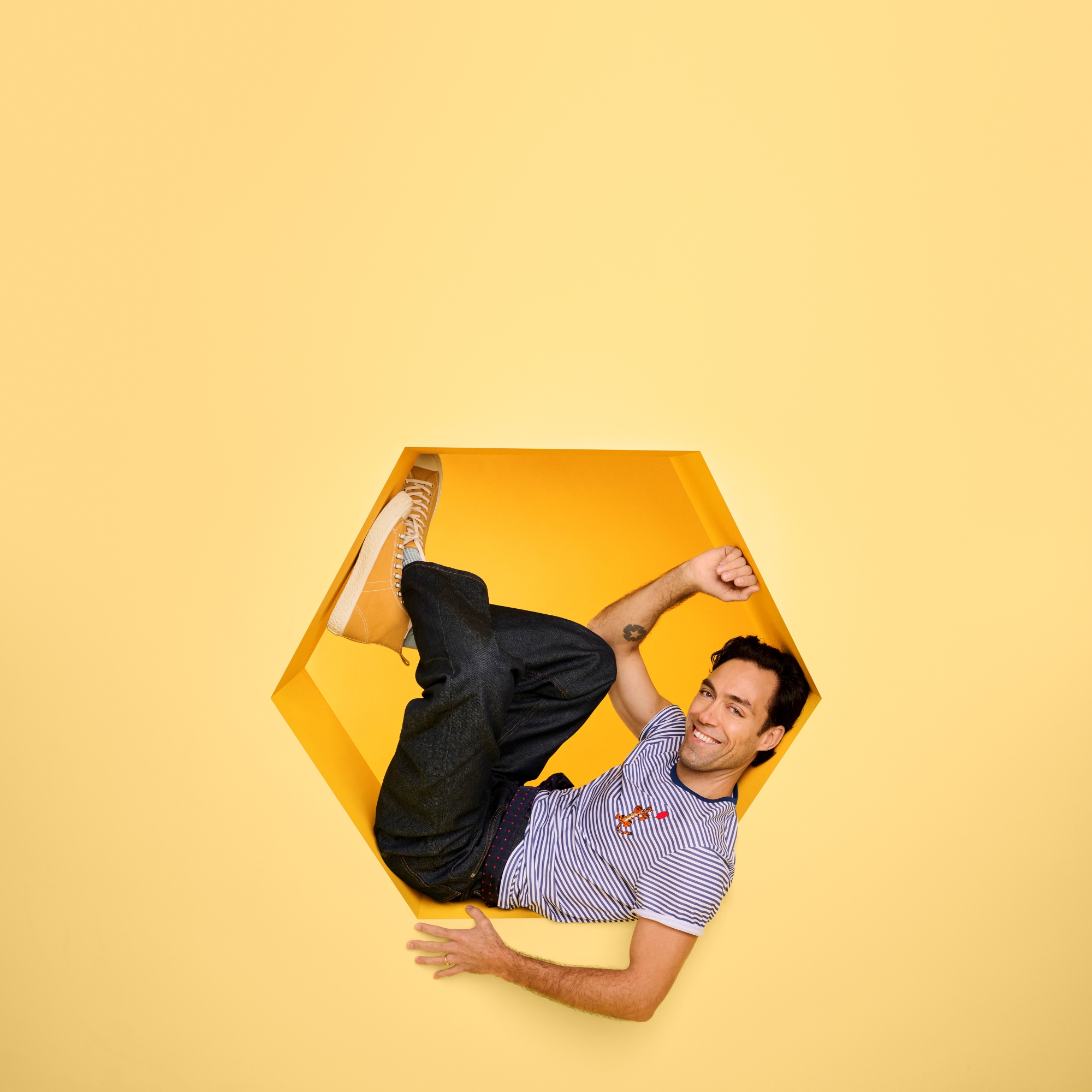 Alex Hassell in the t-shirt