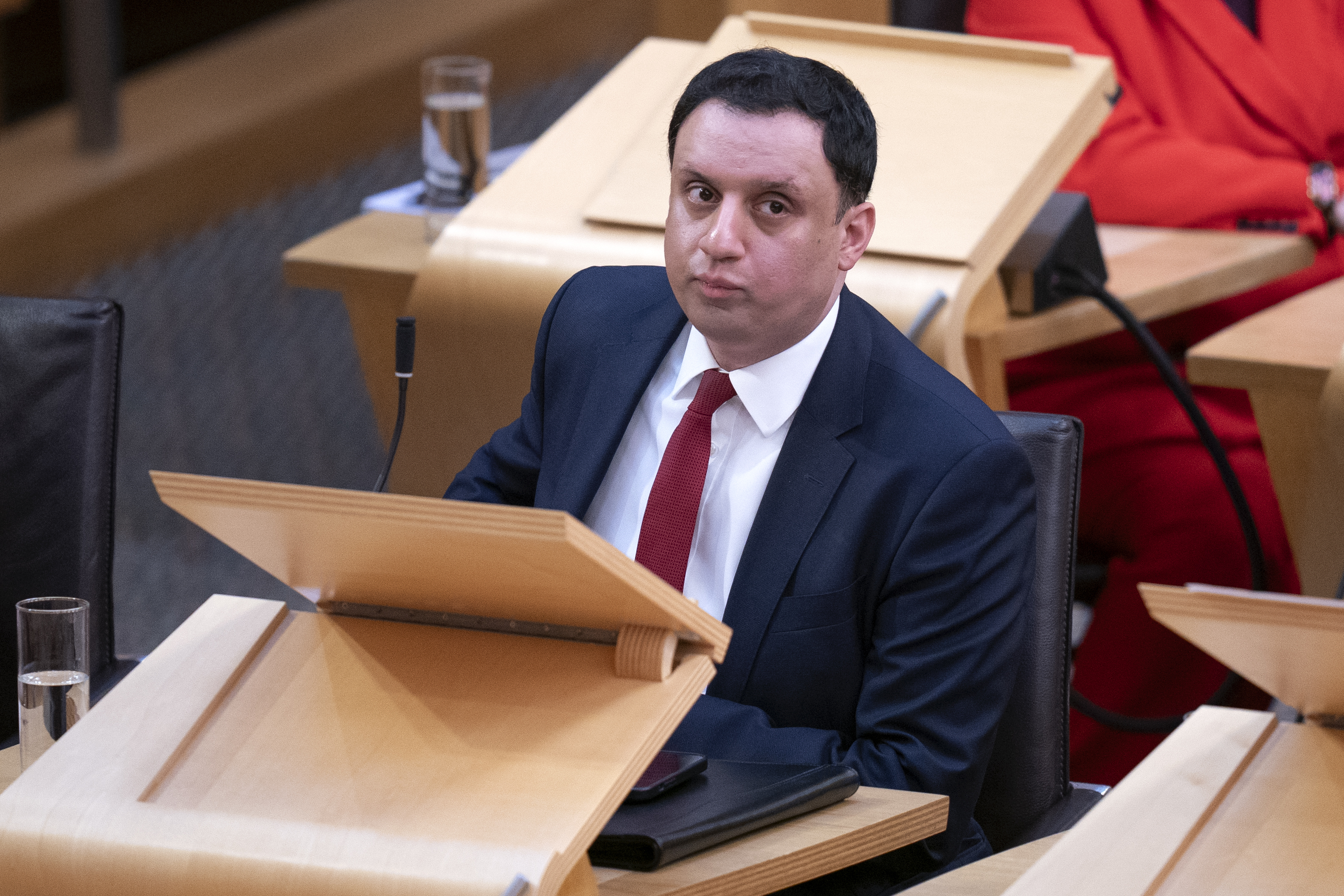 Anas Sarwar seated in Holyrood