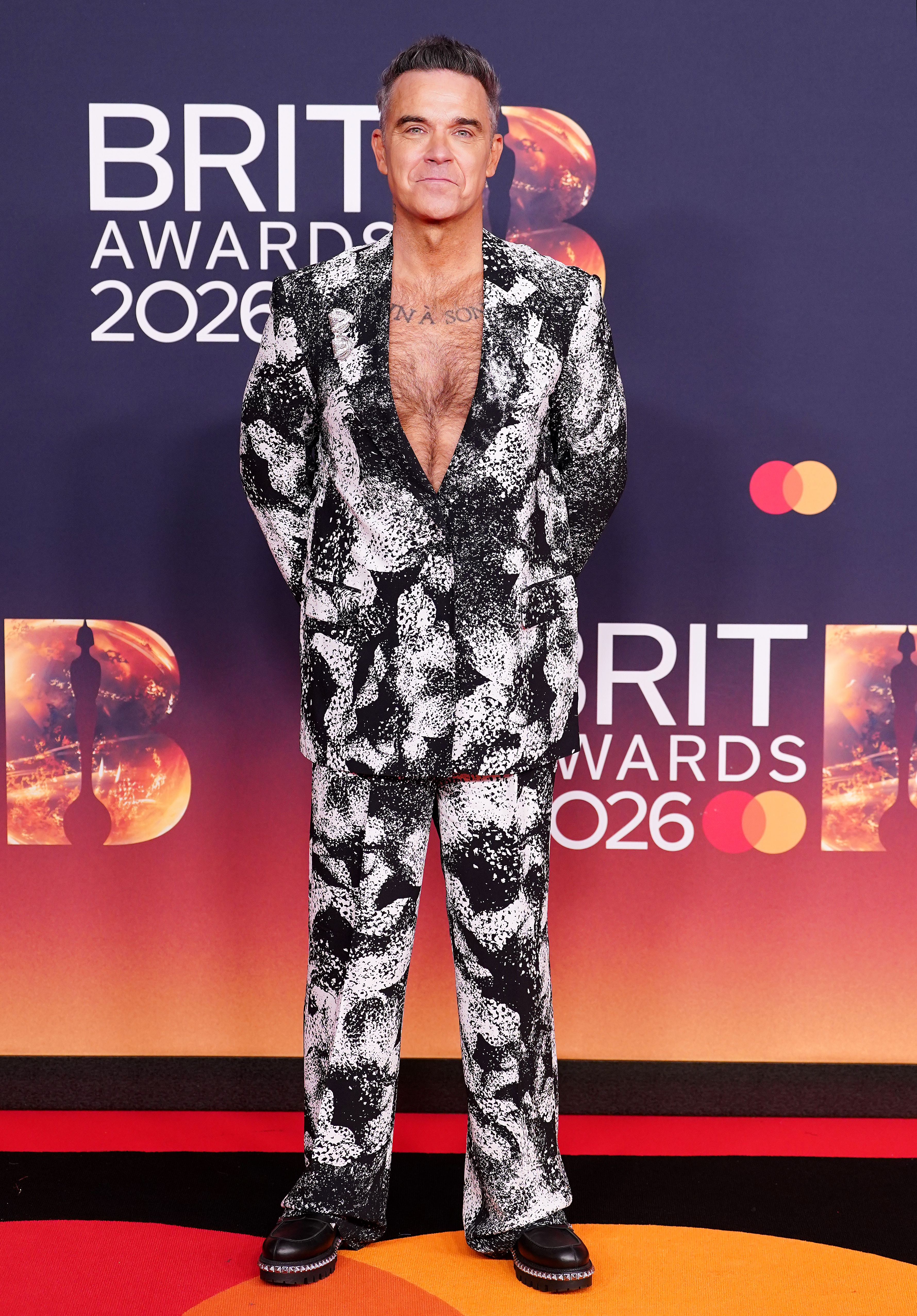 Robbie Williams attending the Brit Awards 2026 at Co-op Live, Manchester
