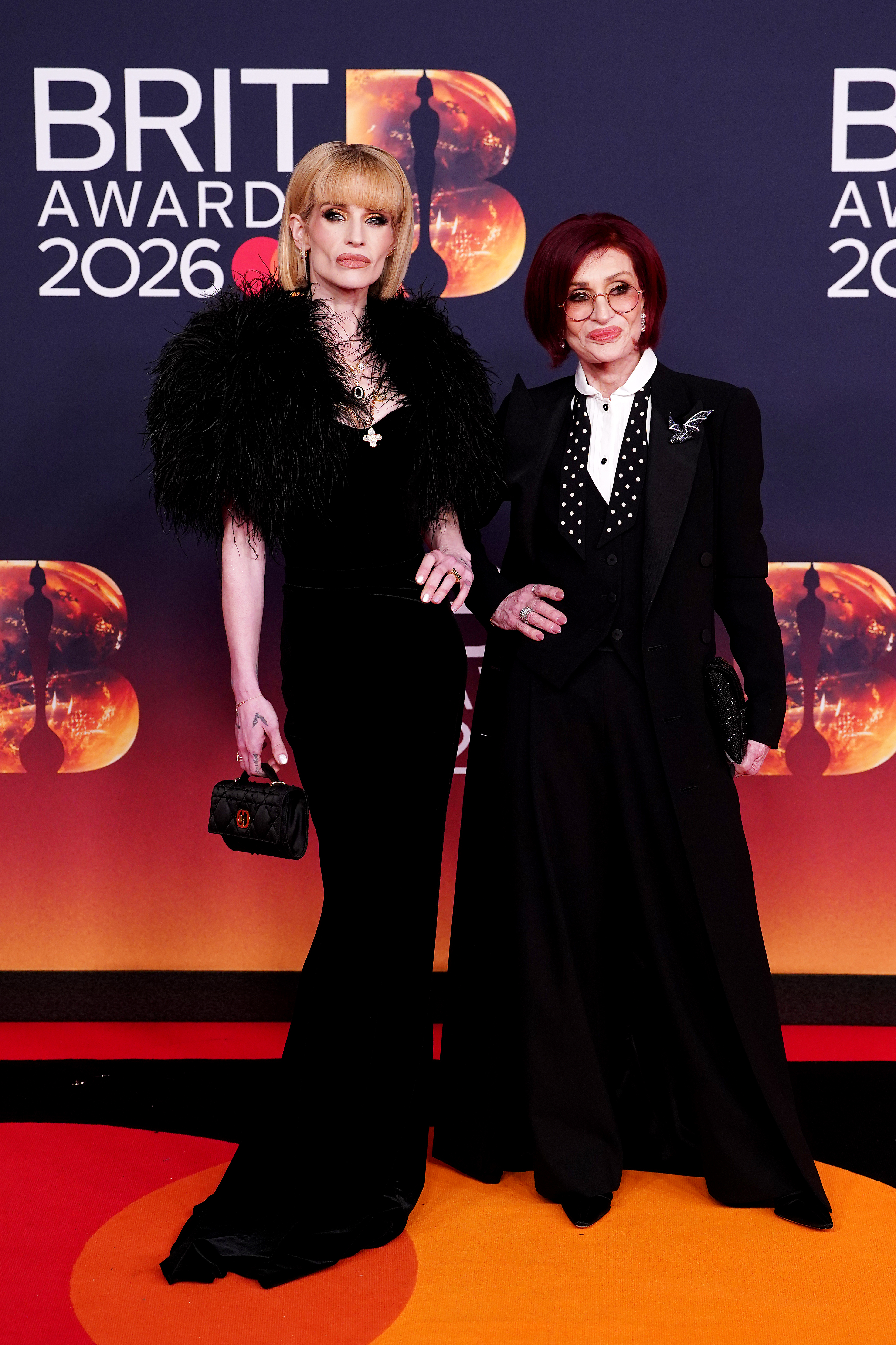 Kelly Osbourne (left) and Sharon Osbourne attending the Brit Awards 2026 at Co-op Live, Manchester