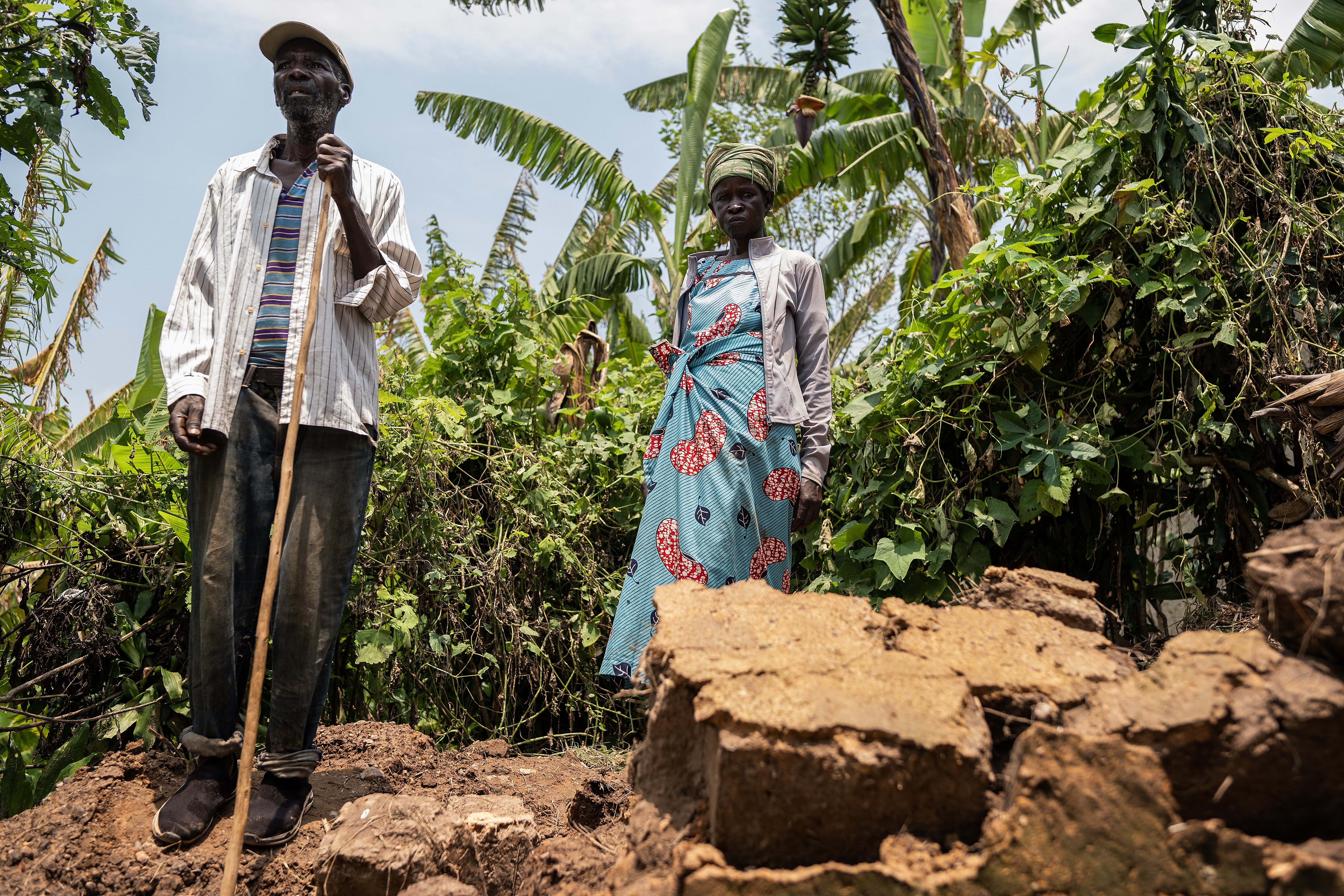 Anne Marie Mukankuranga and her husband Ahimana Estorico at their damaged home 