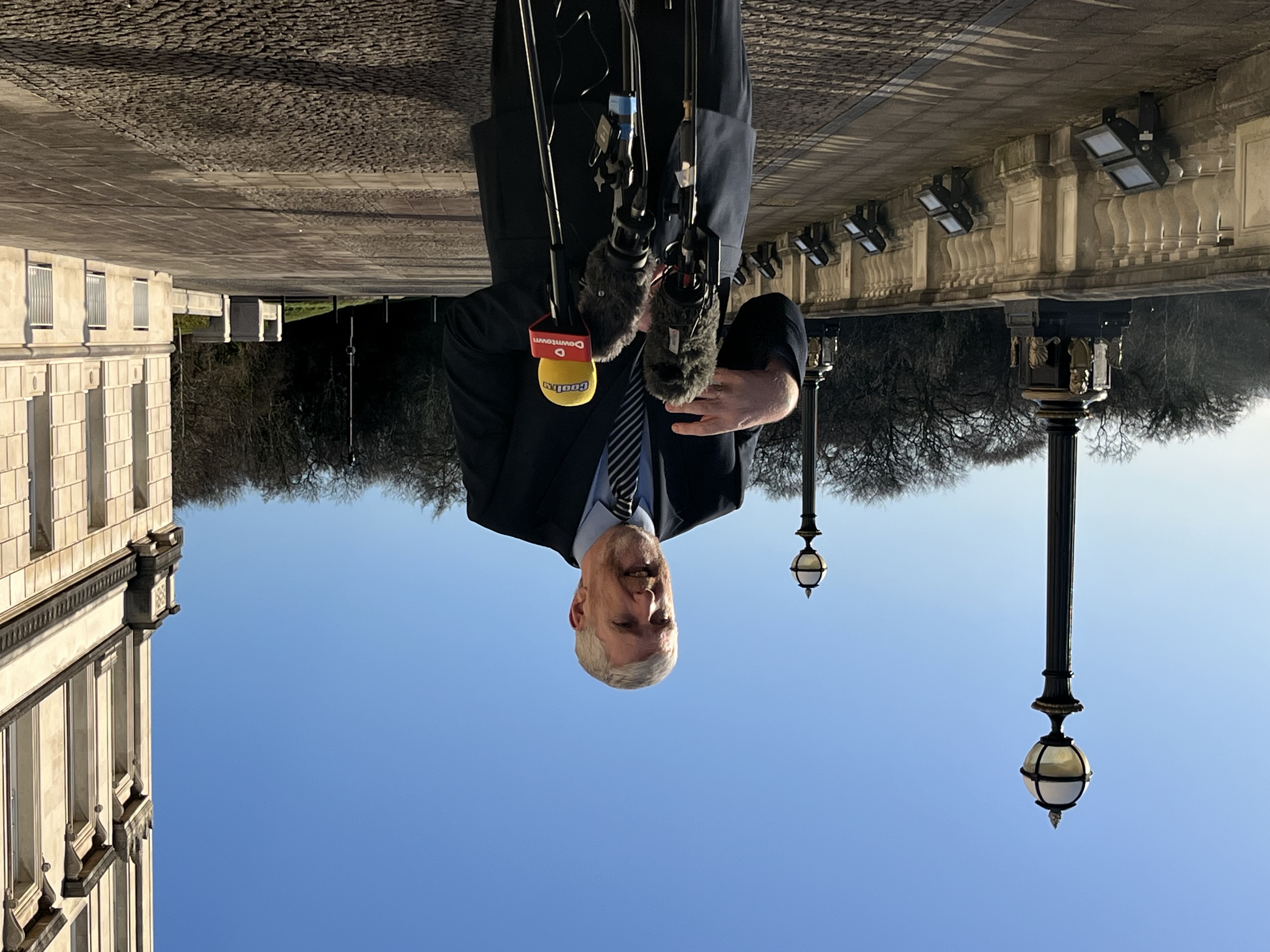 Stormont's Finance Minister John O'Dowd speaking to the media