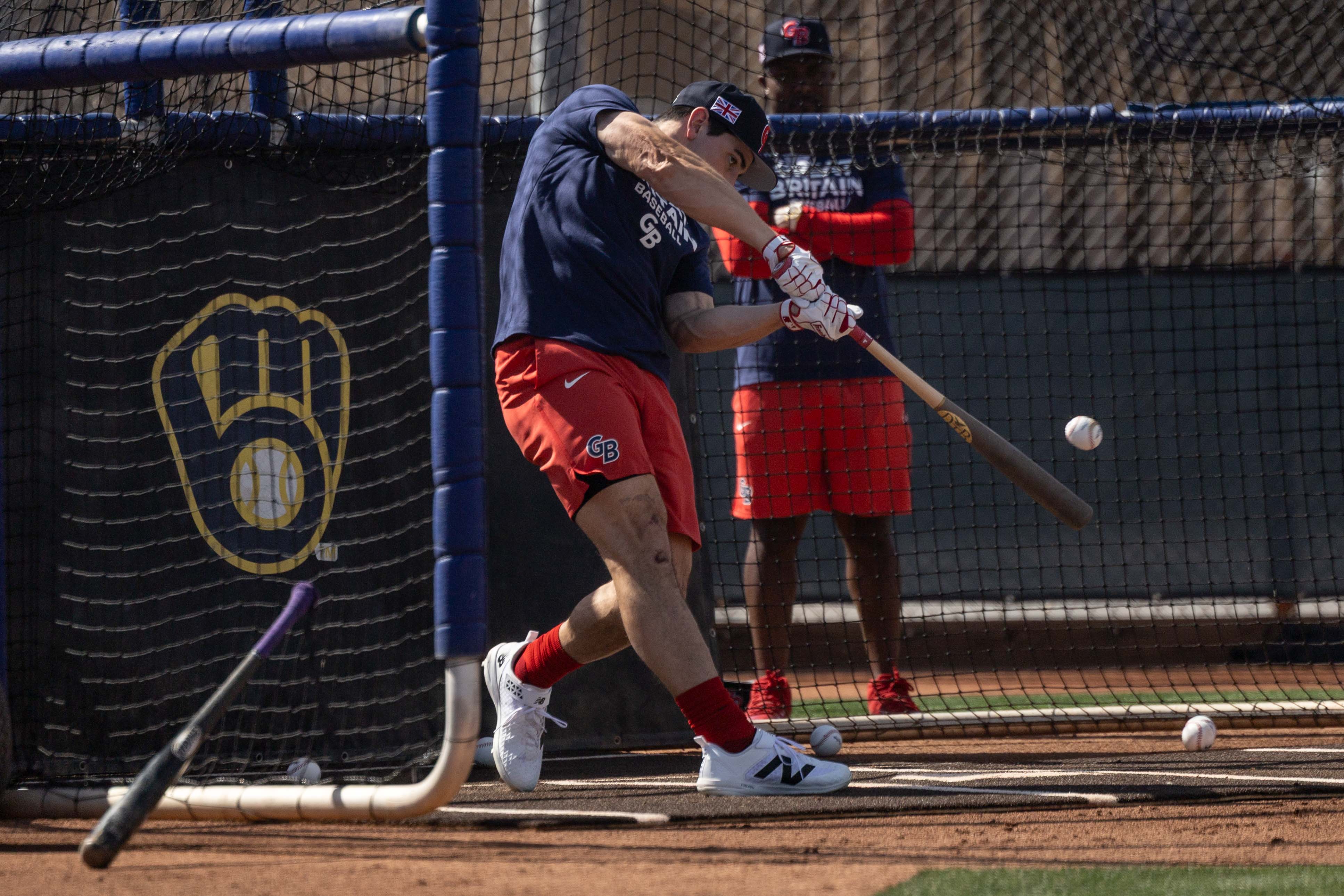 A Great Britain baseball player takes batting practice ahead of the World Baseball Classic