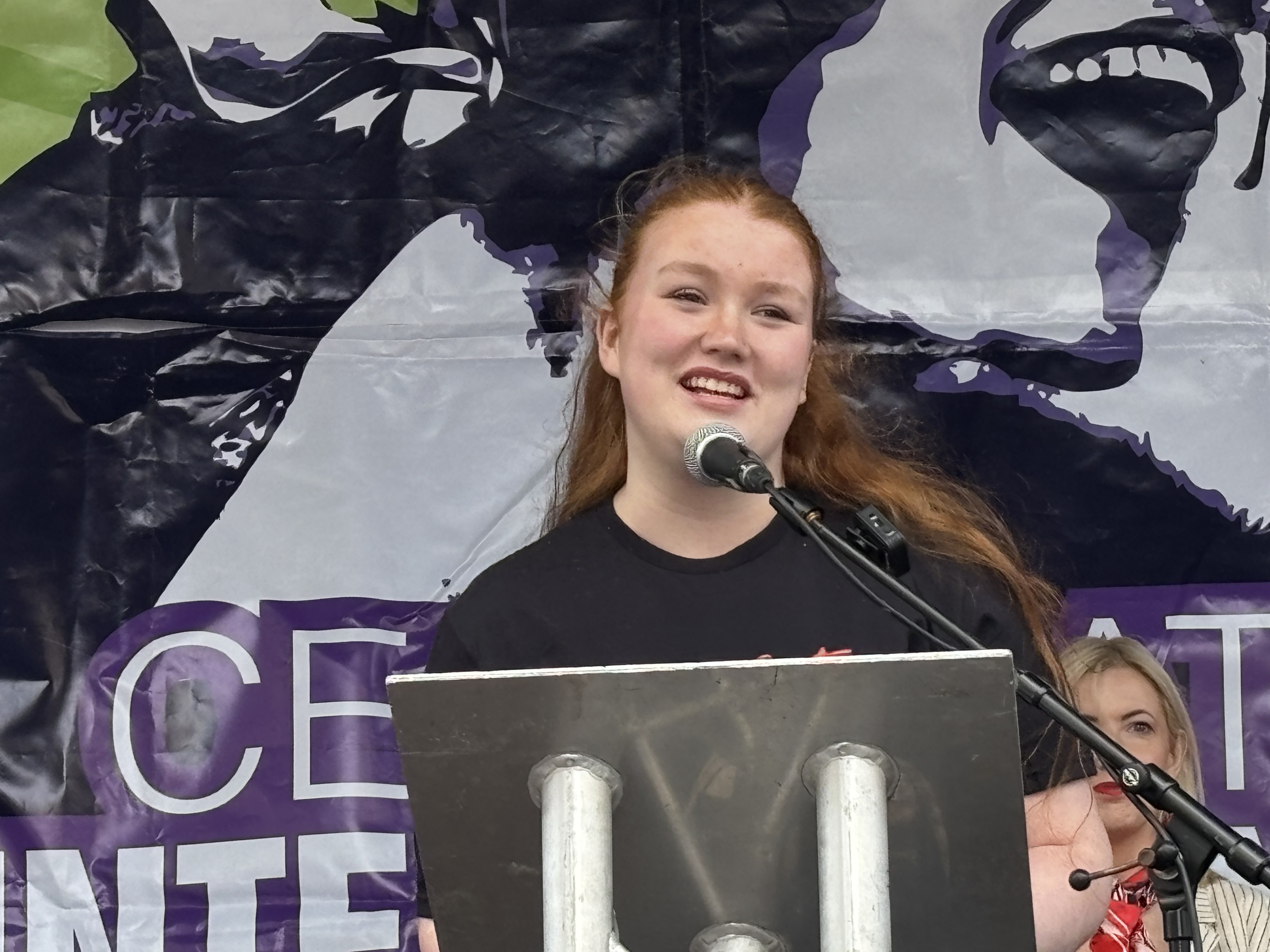 Aoife Nic An Tuile, of Youth Action, speaking at the International Women's Day rally in Belfast