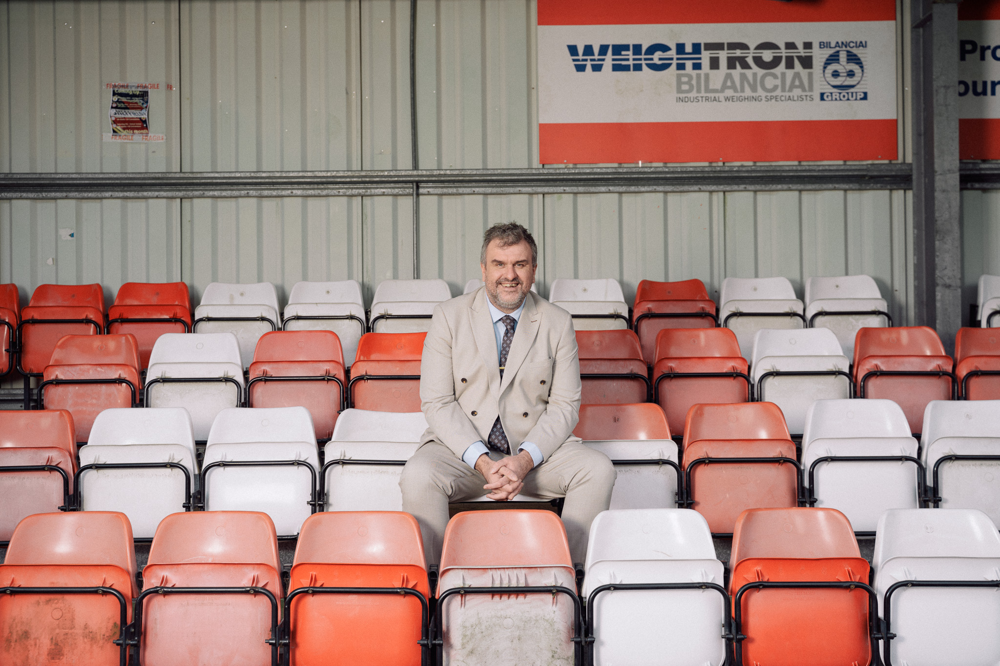 Jon McClure sits in the stand