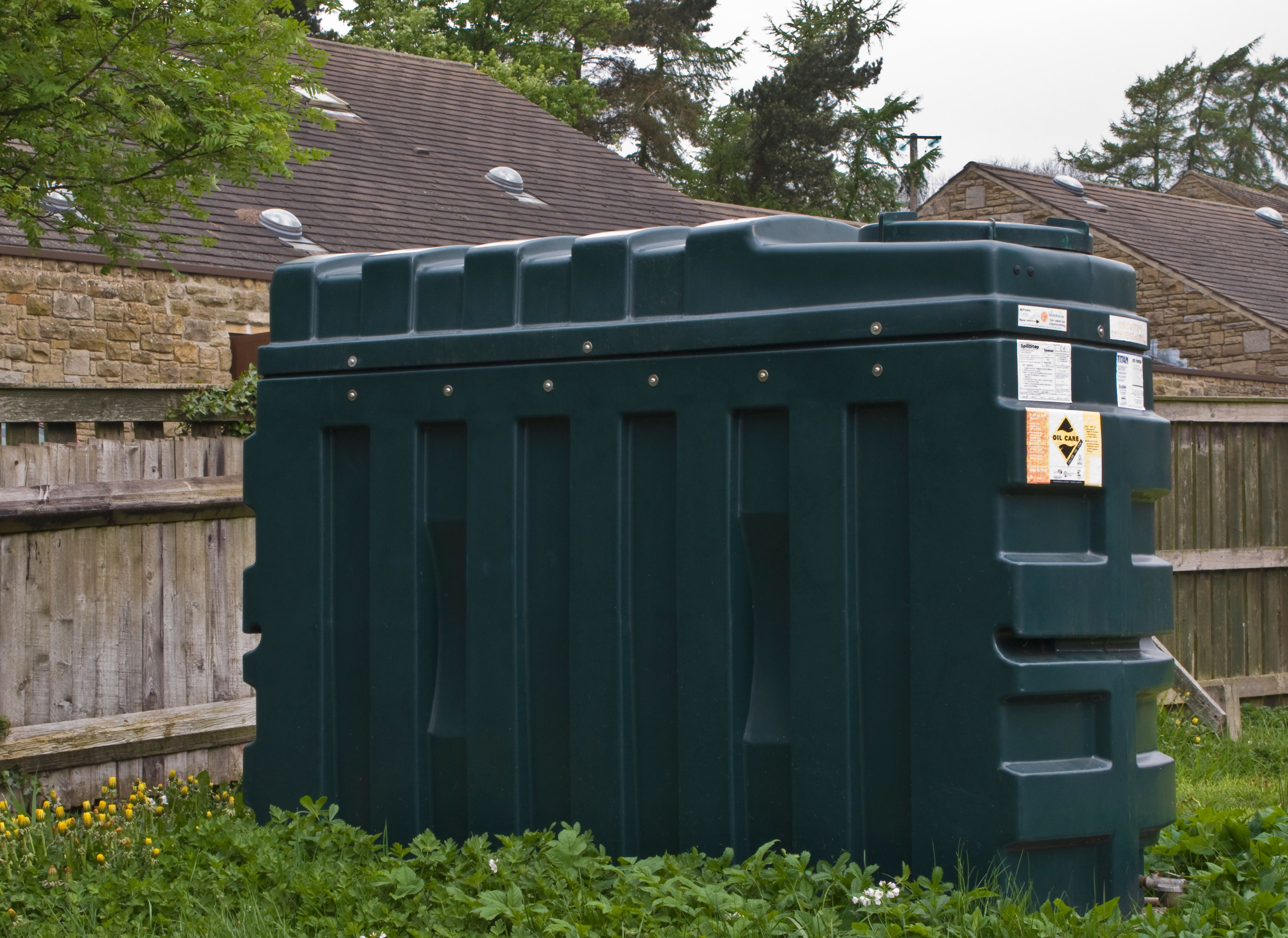 A heating oil storage container in a back garden