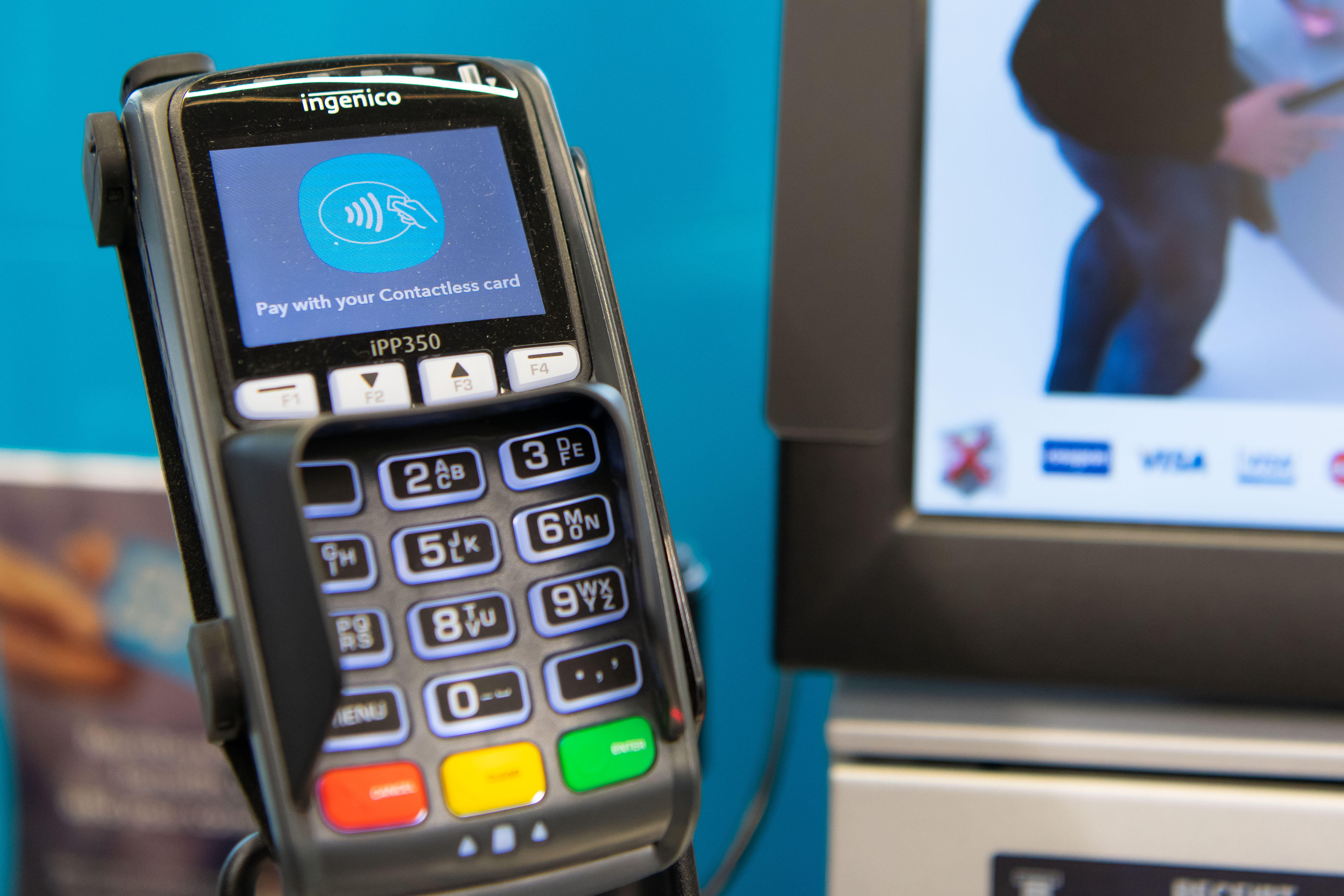 A contactless chip and pin payment terminal in a supermarket shop