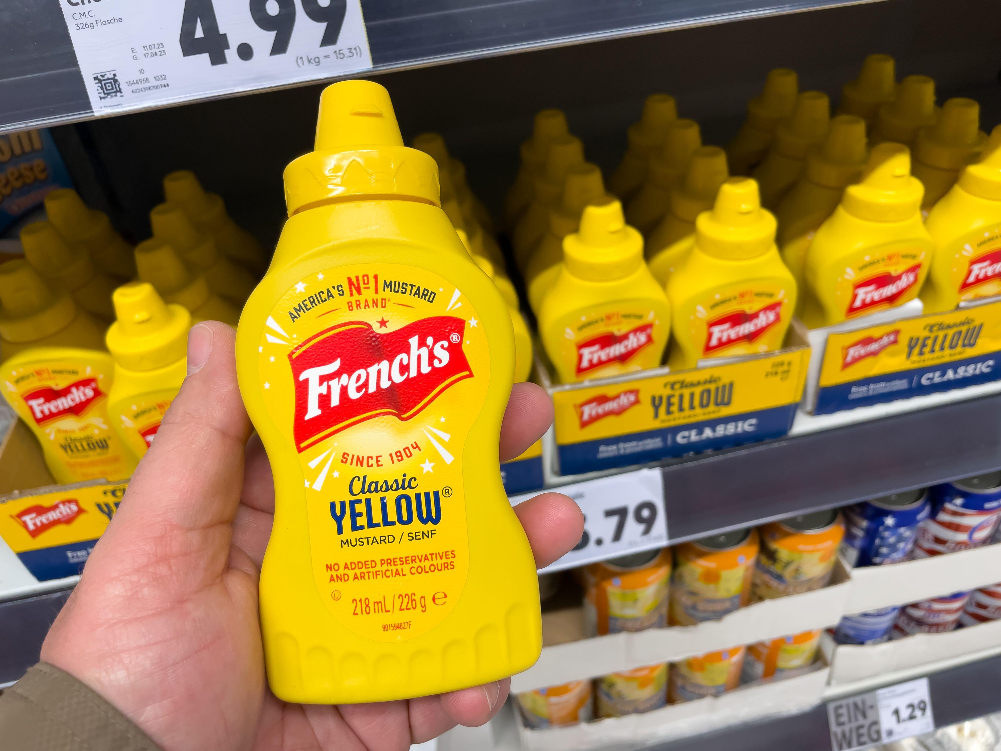 A person holding French's mustard 