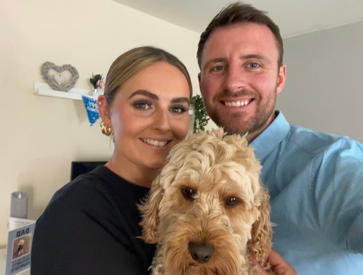 Jess Roberts and Darren Whitley with their dog