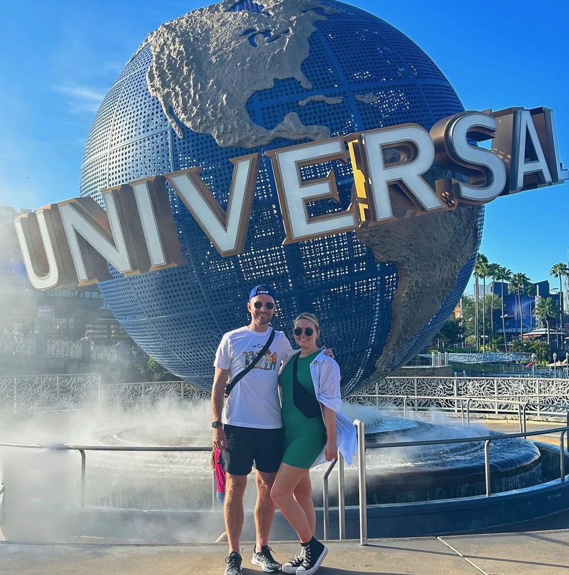 Jess Roberts and Darren Whitley in front the of Universal Studios sign