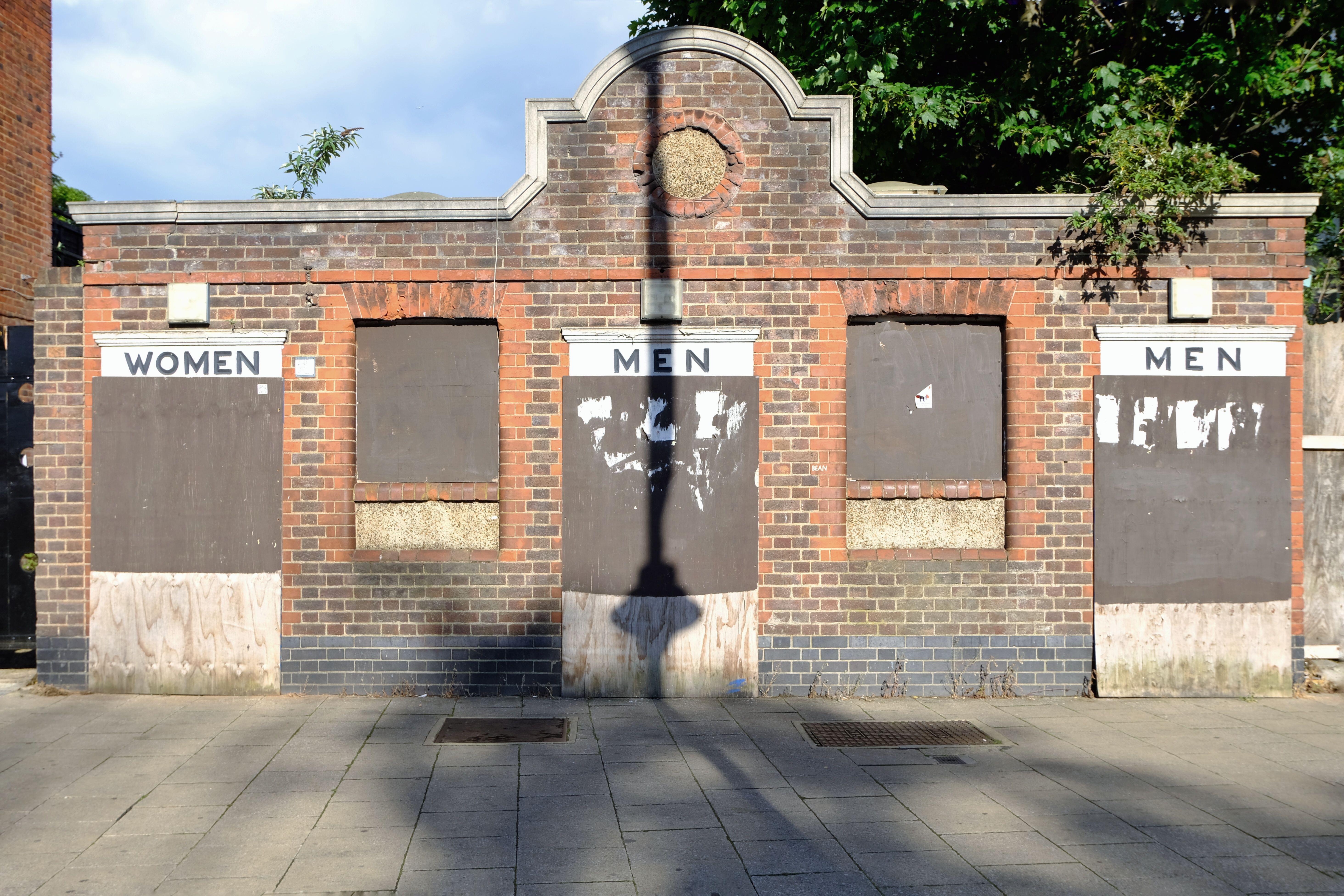 A disused and boarded up Victorian toilet block in High Road, Tottenham (Alamy/PA)