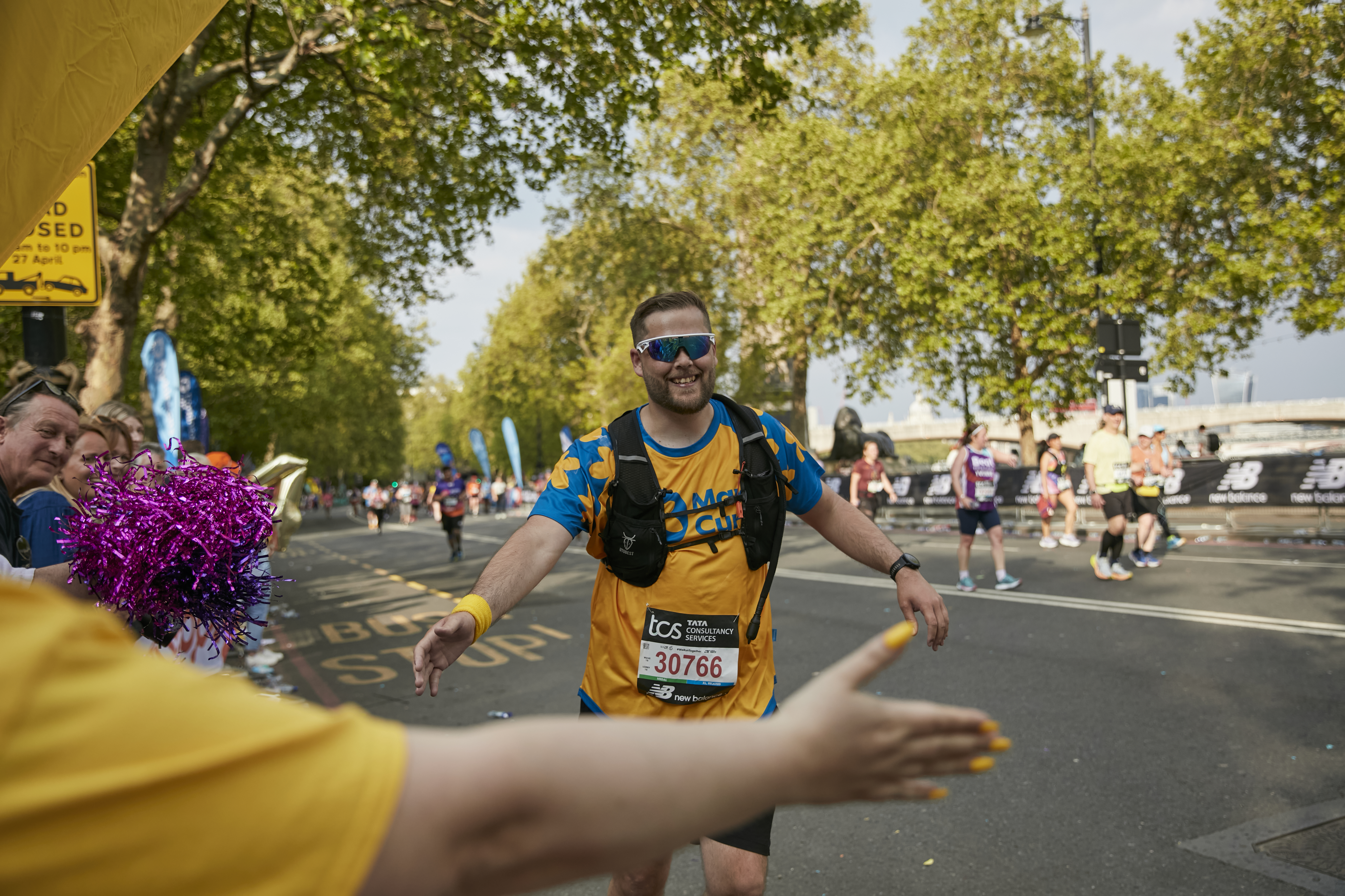 Neil Howarth running in a for Marie Curie top during the TCS London Marathon in 2025 