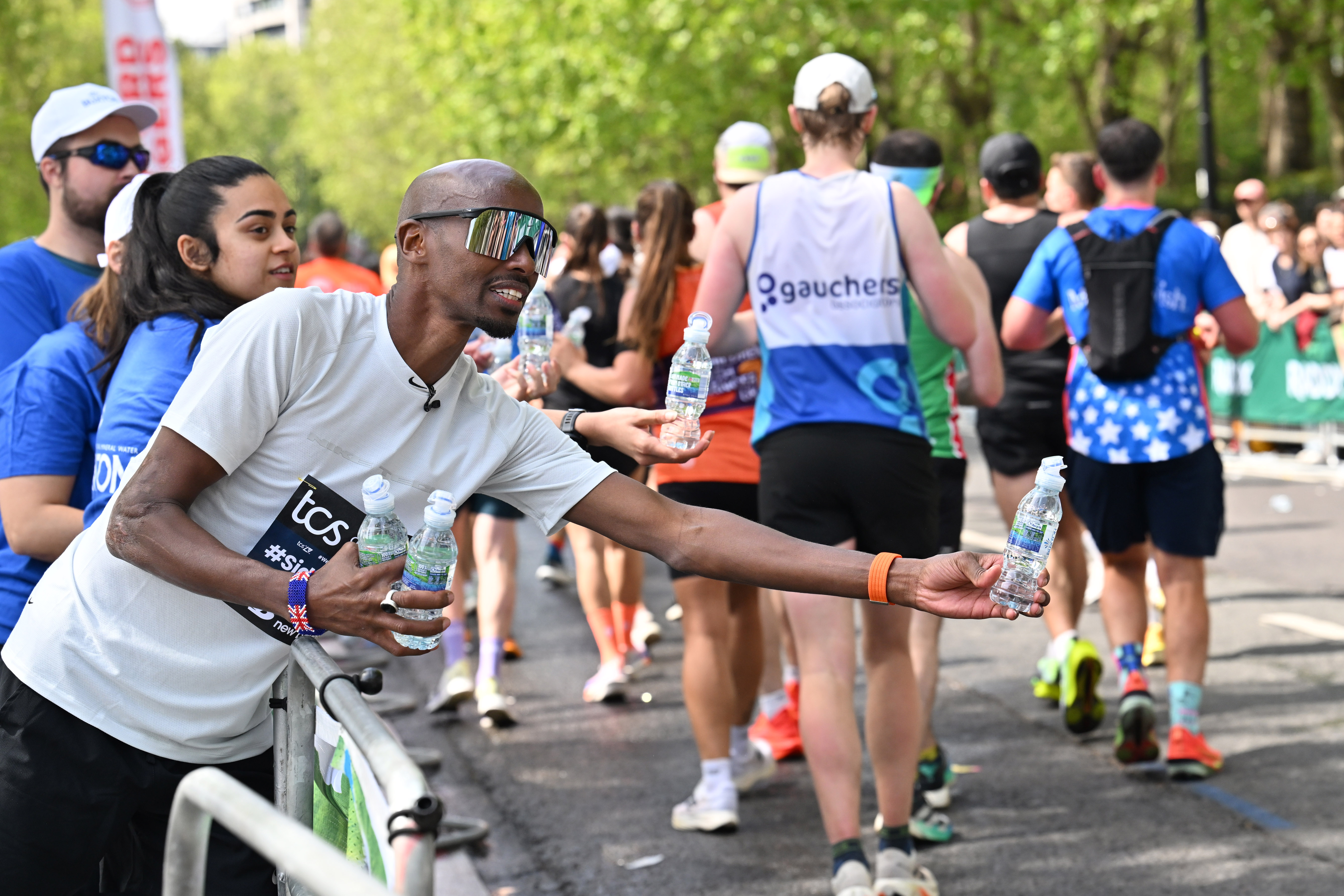 Sir Mo Farah at the Buxton Natural Mineral Water station in Embankment during the TCS London Marathon (Jas Lehal/PA Media Assignments)