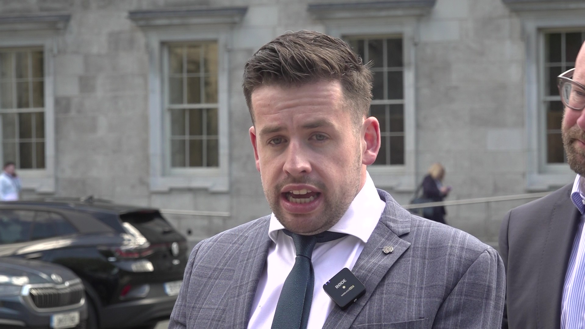 Labour housing spokesperson Conor Sheehan talking to reporters outside Leinster House