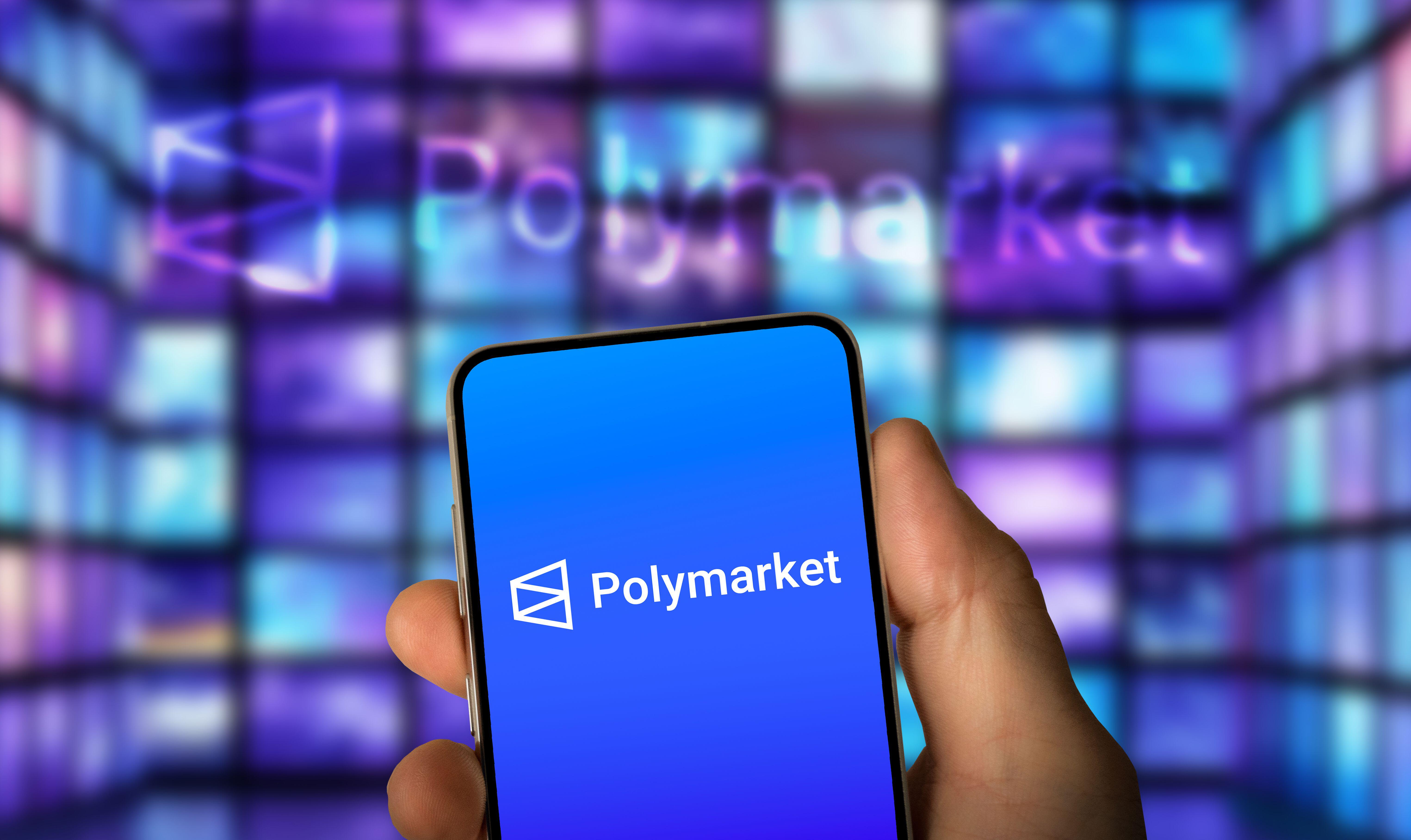 Polymarket logo on smartphone