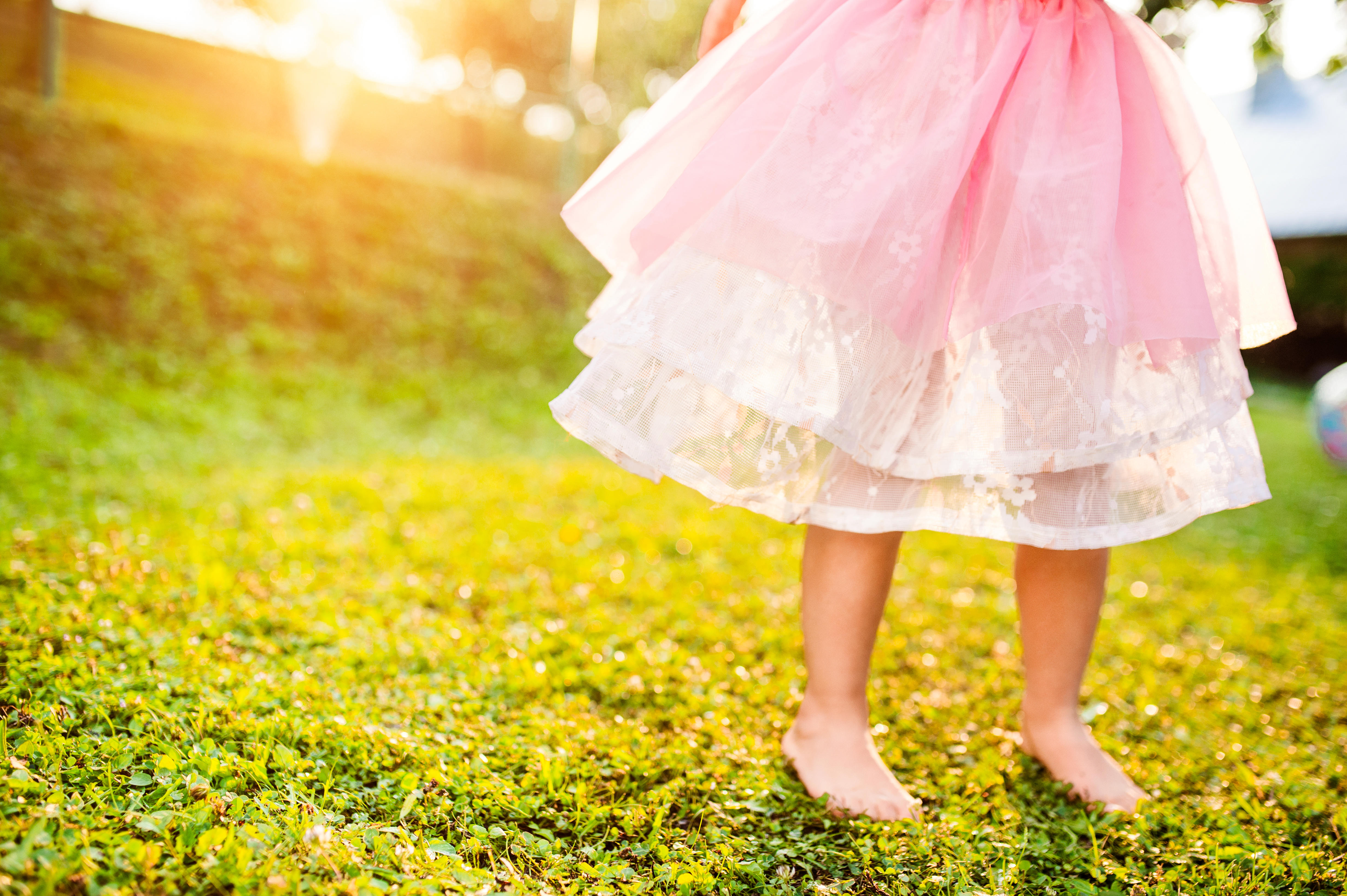 A girl in a dress in a garden