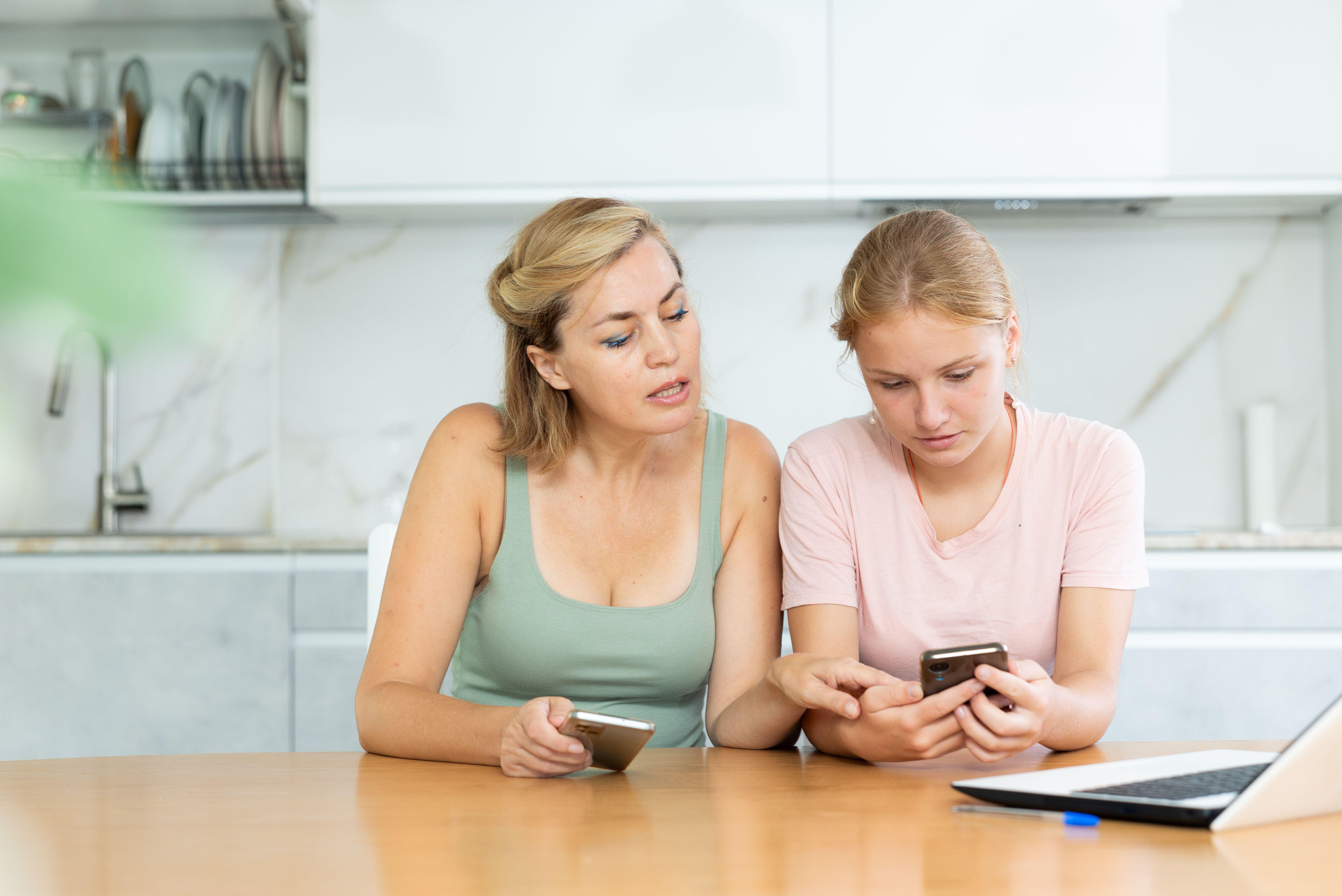 Girl talking to mum about phone and social media 
