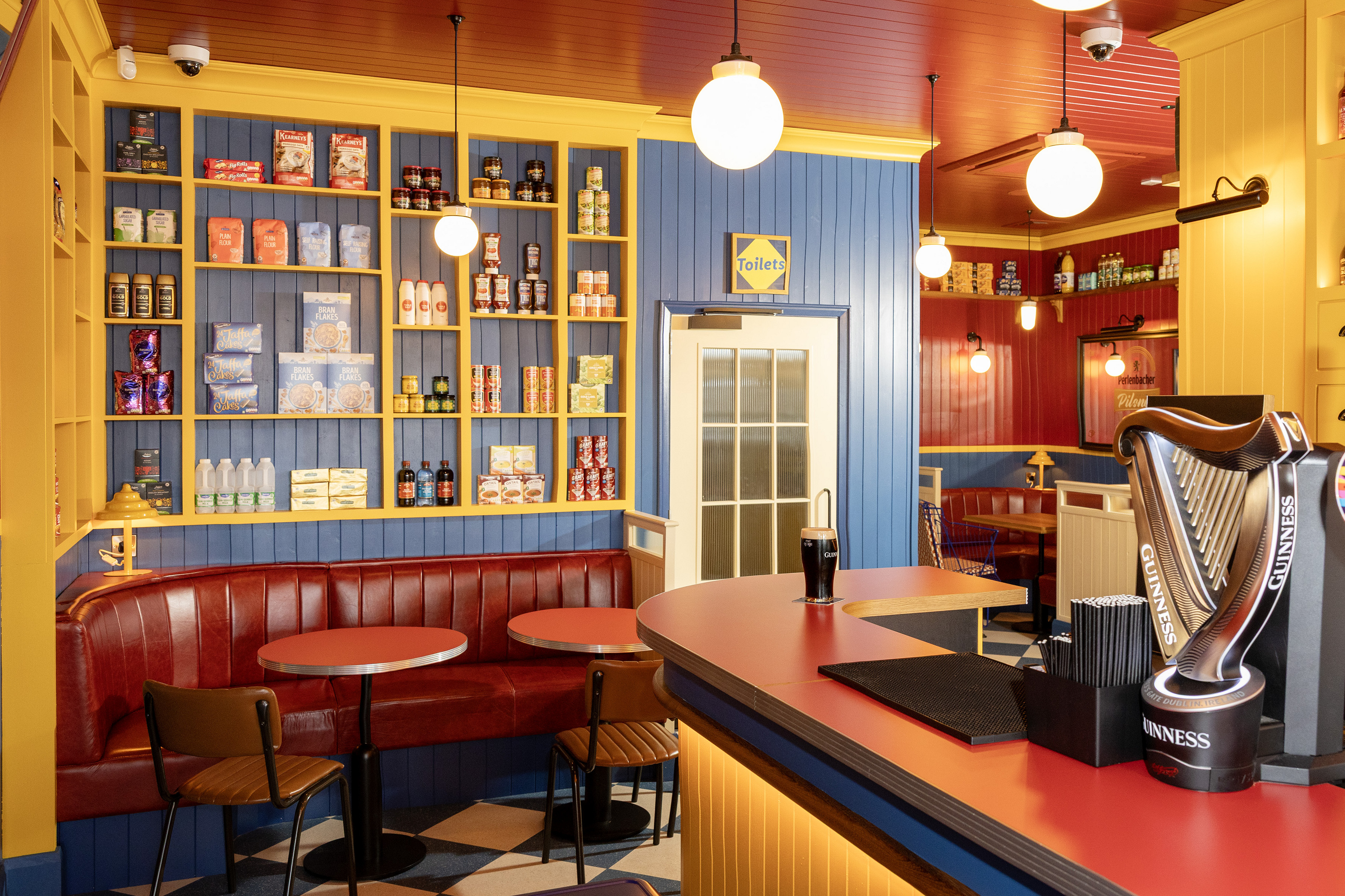 Interior of The Middle Ale pub, featuring Lidl products on shelves
