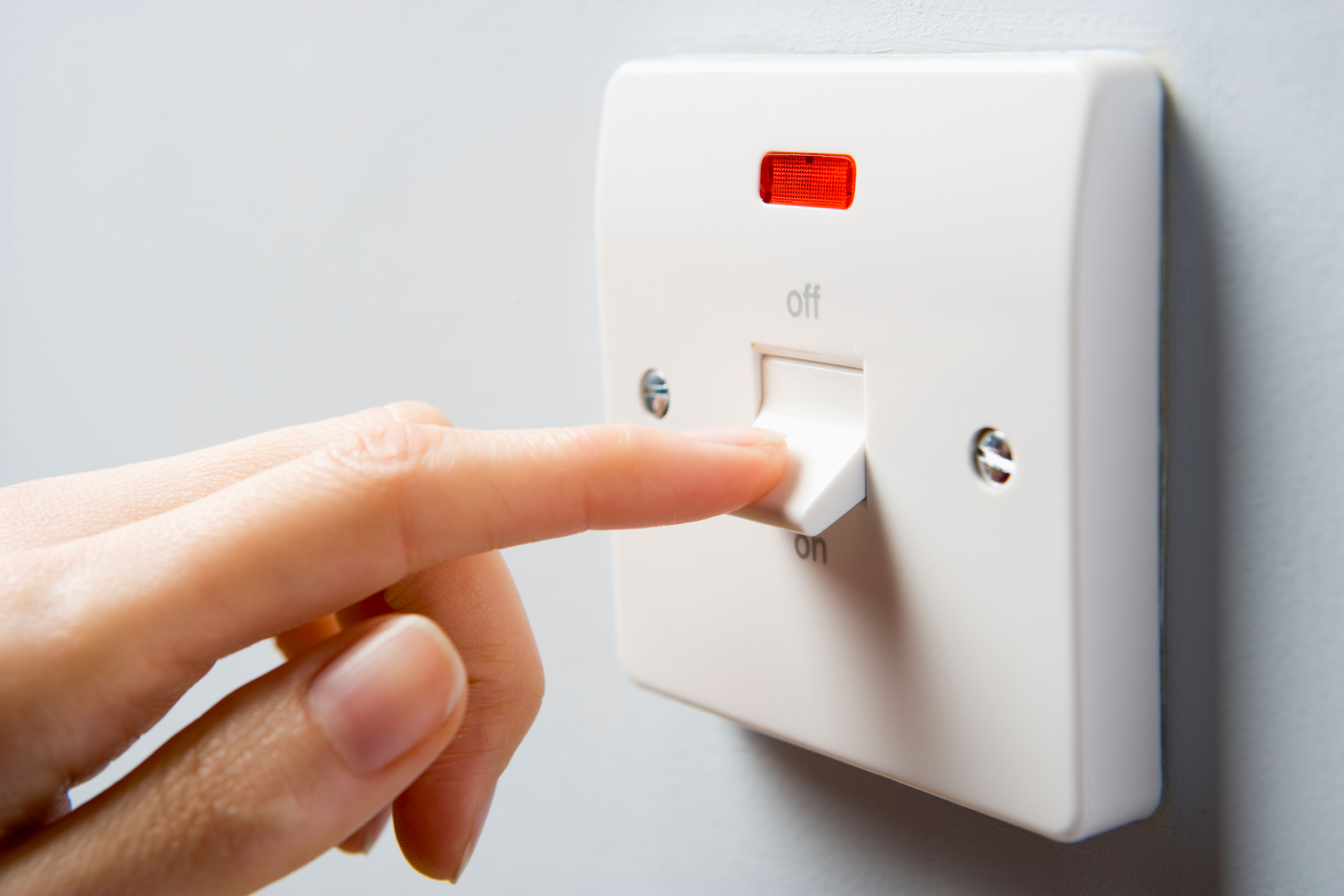 Close Up Picture Of Switch Being Turned On