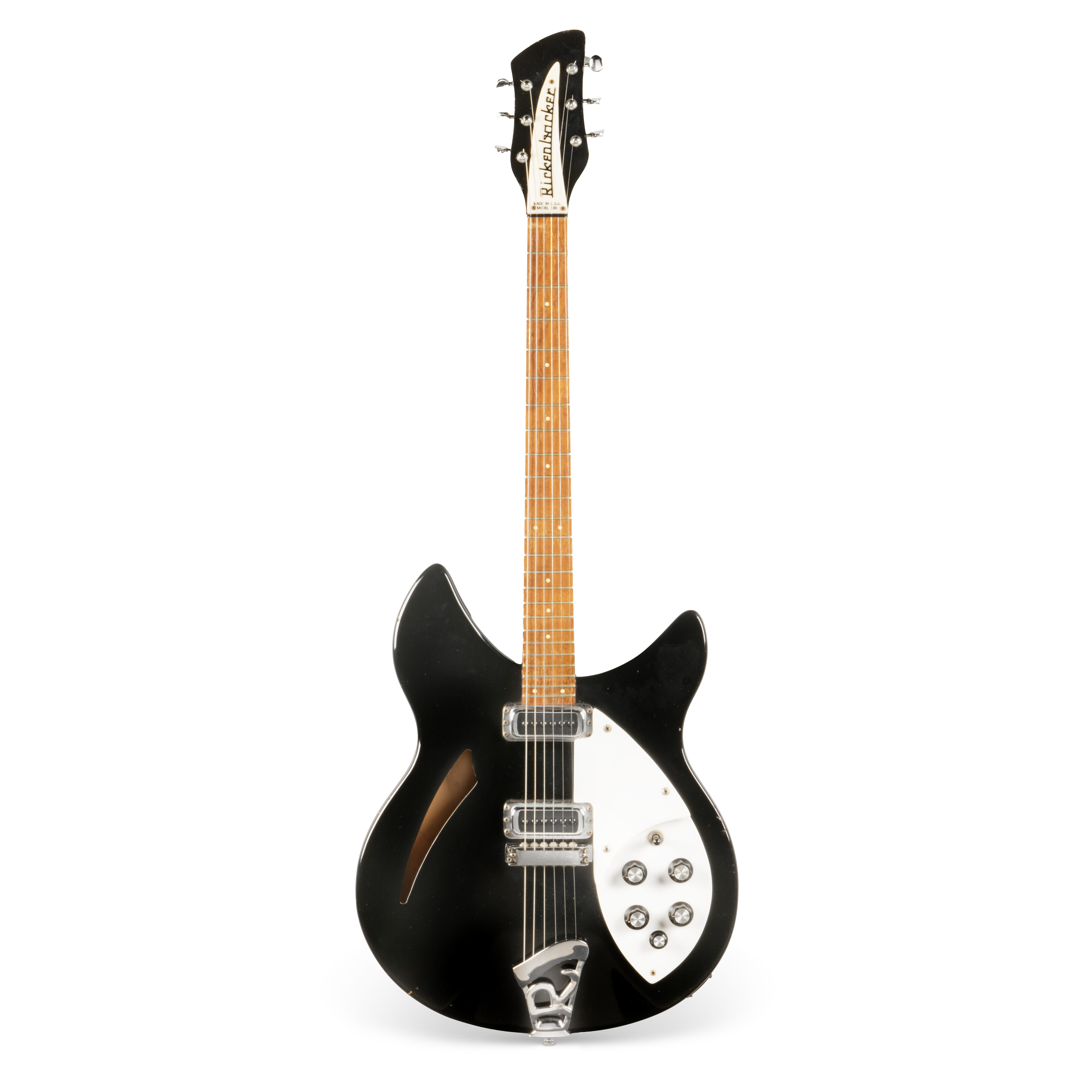View of a black and white Rickenbacker guitar