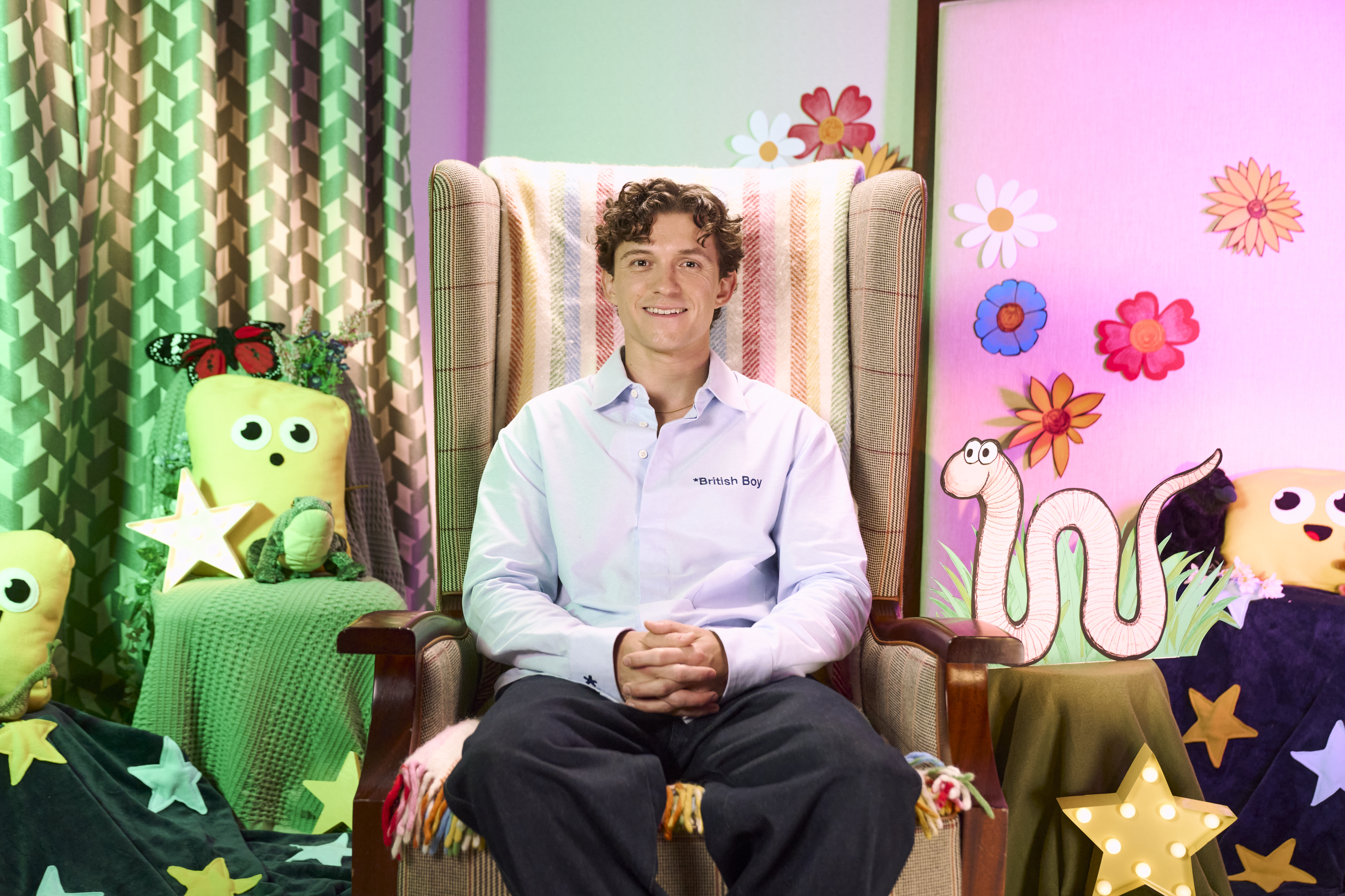 Tom Holland reading a book on CBeebies Bedtime Story