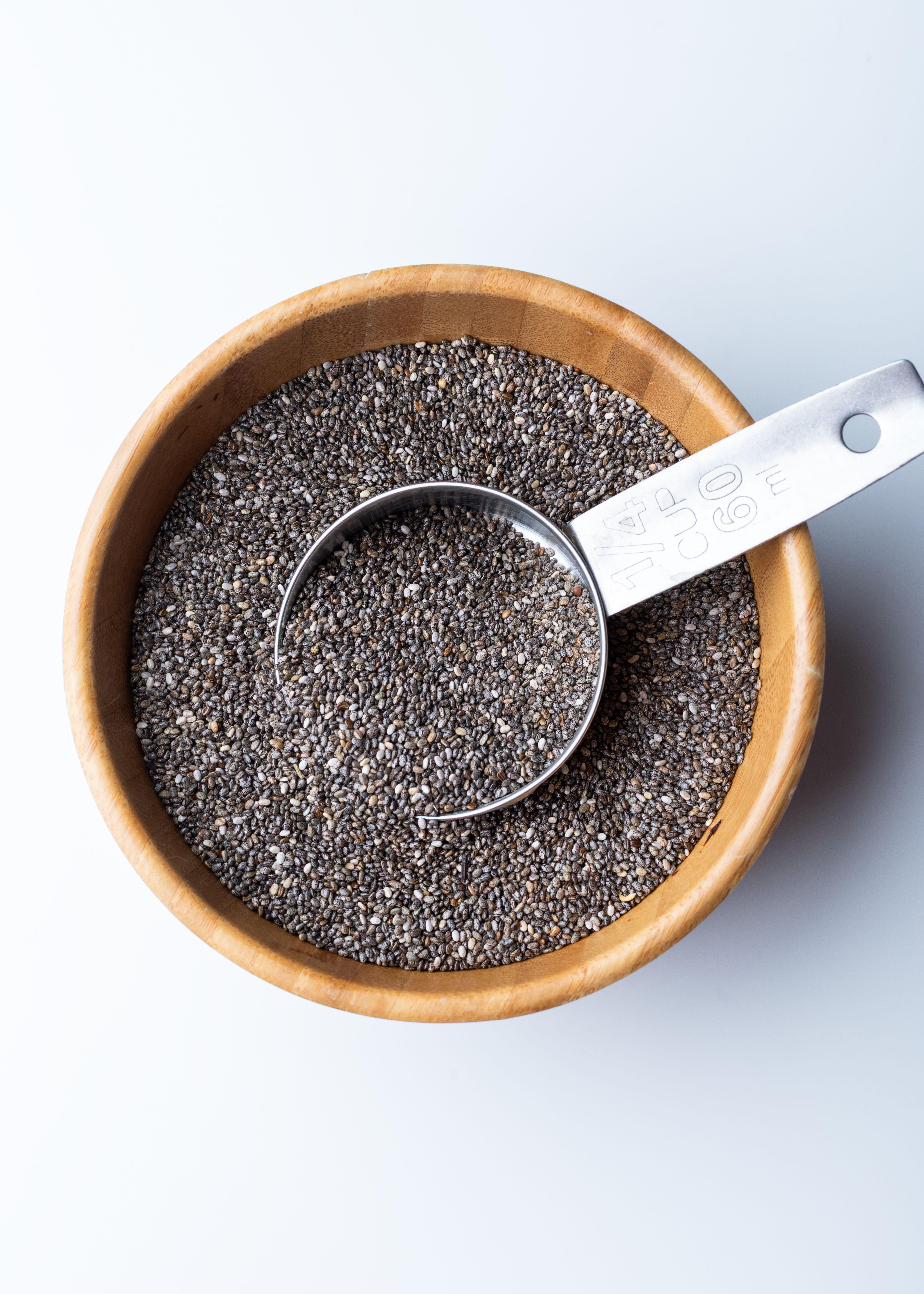  Wooden bowl filled with chia seeds