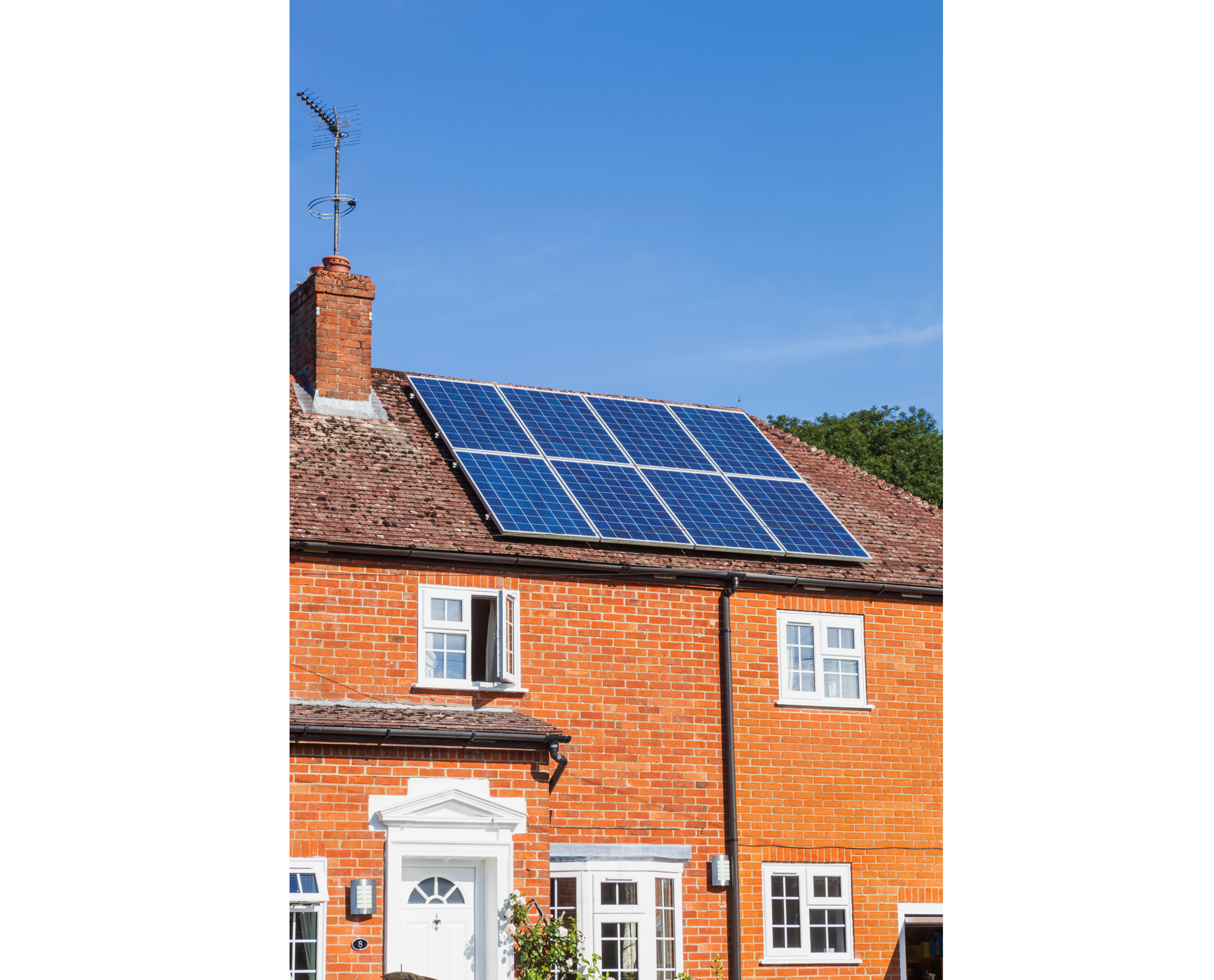Rooftop solar panels on a two-storey house
