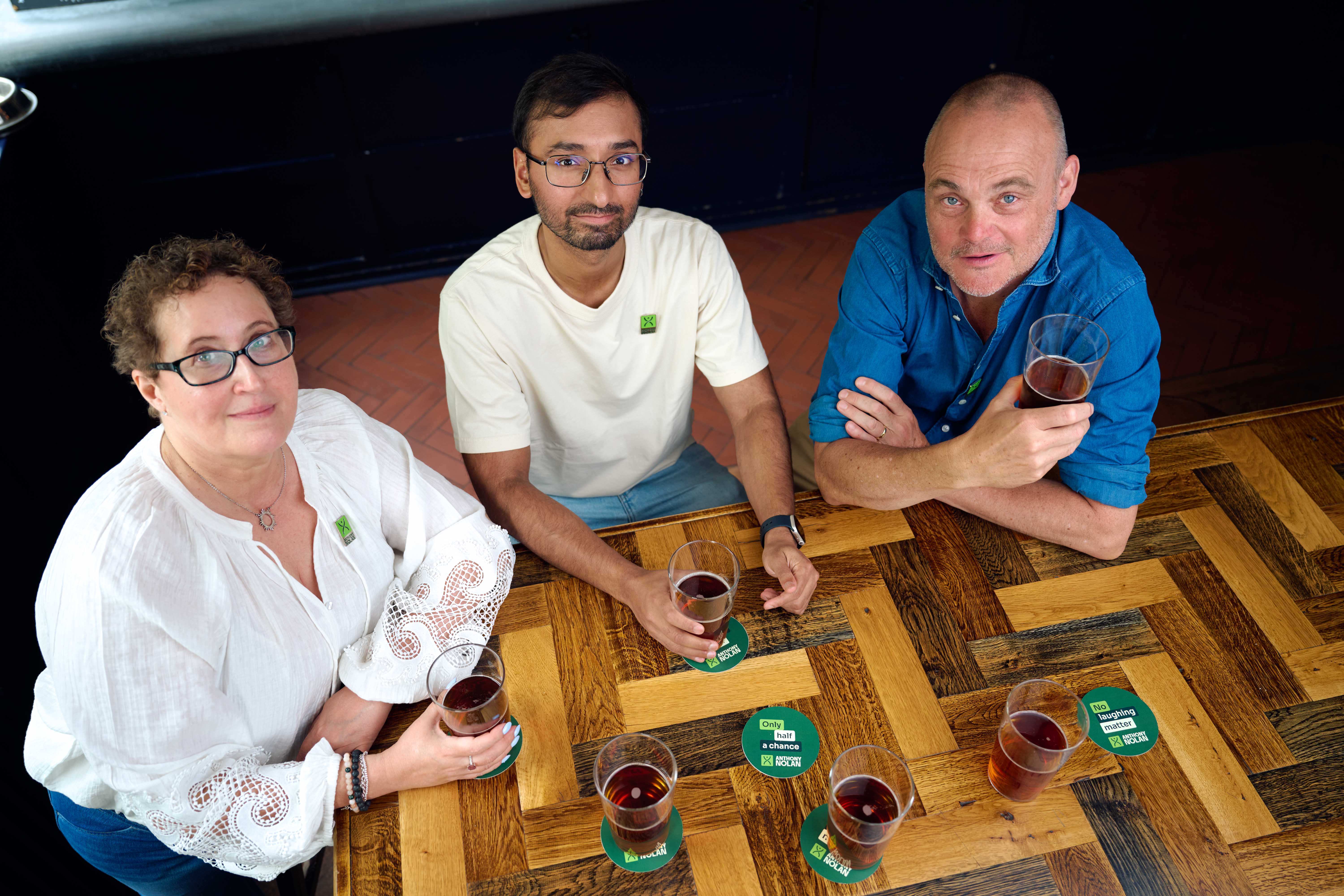 Al Murray and others at a pub table