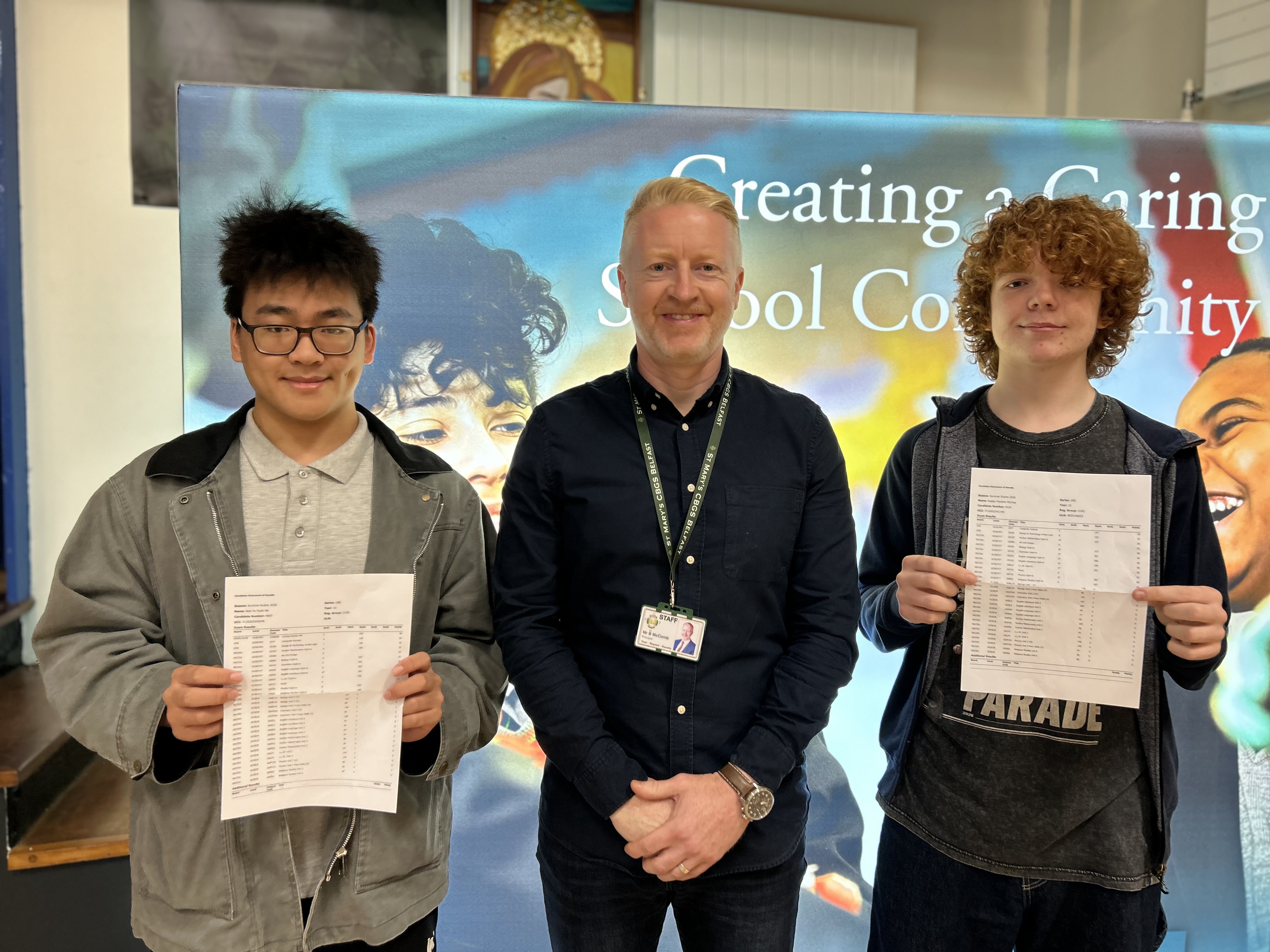 Students and headteacher with GCSE results
