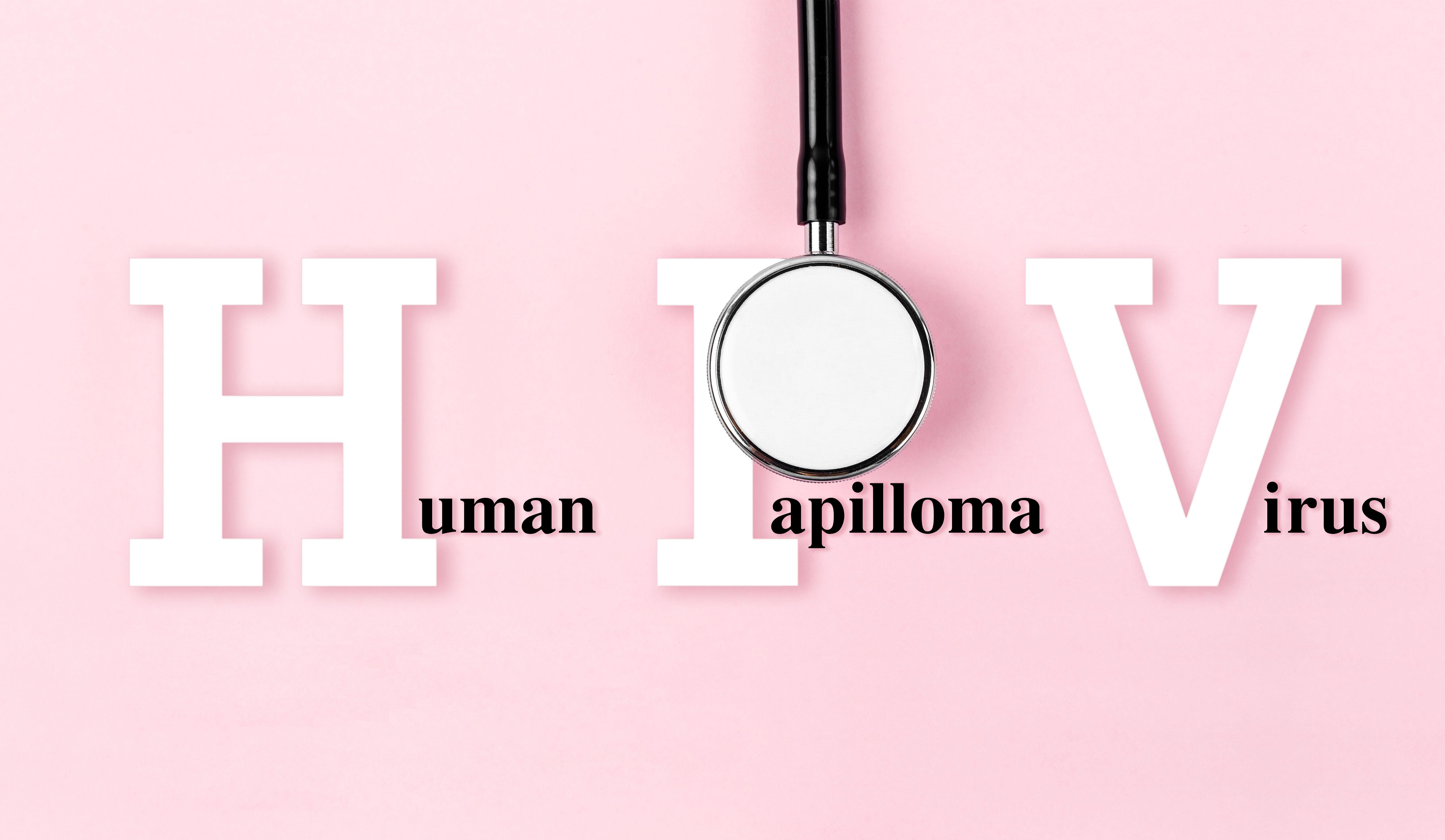 Human Papillomavirus written on a pink background next to a stethoscope 