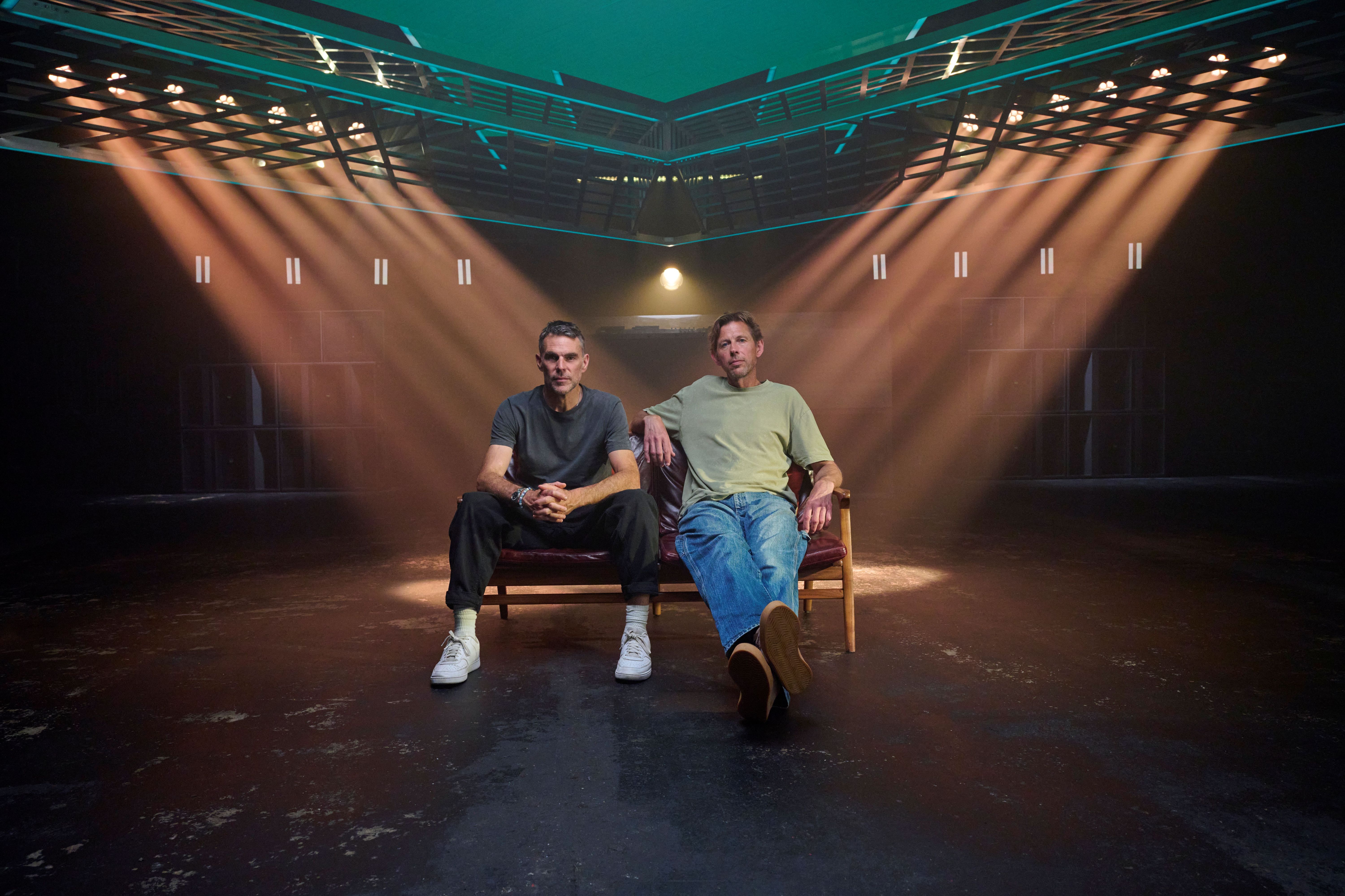 Groove Armada's Tom Findlay (l) and Andy Cato (r) sitting next to each other (Stewart Williams/PA)