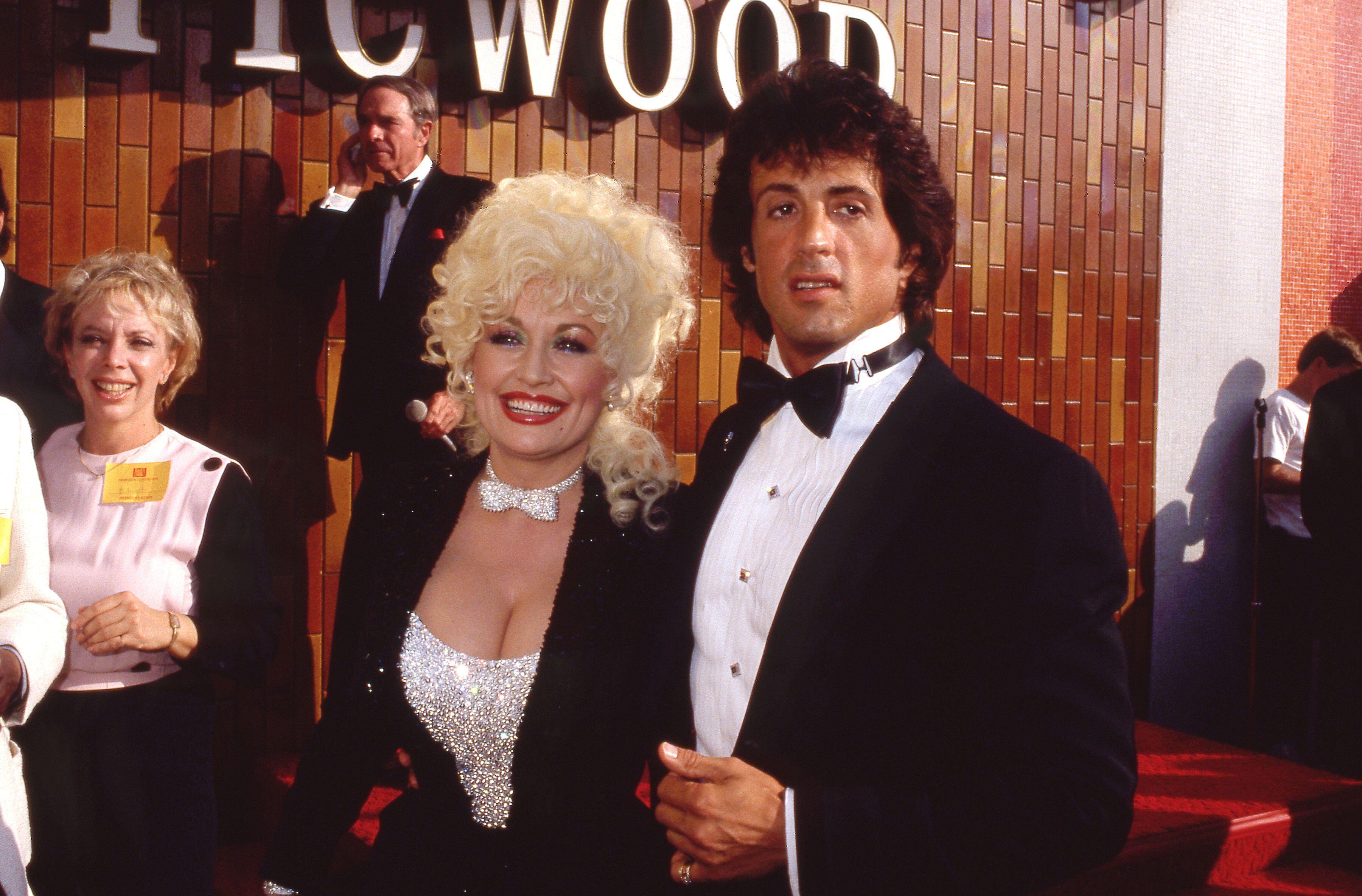 Sylvester Stallone and Dolly Parton at the Rhinestone premiere in 1984